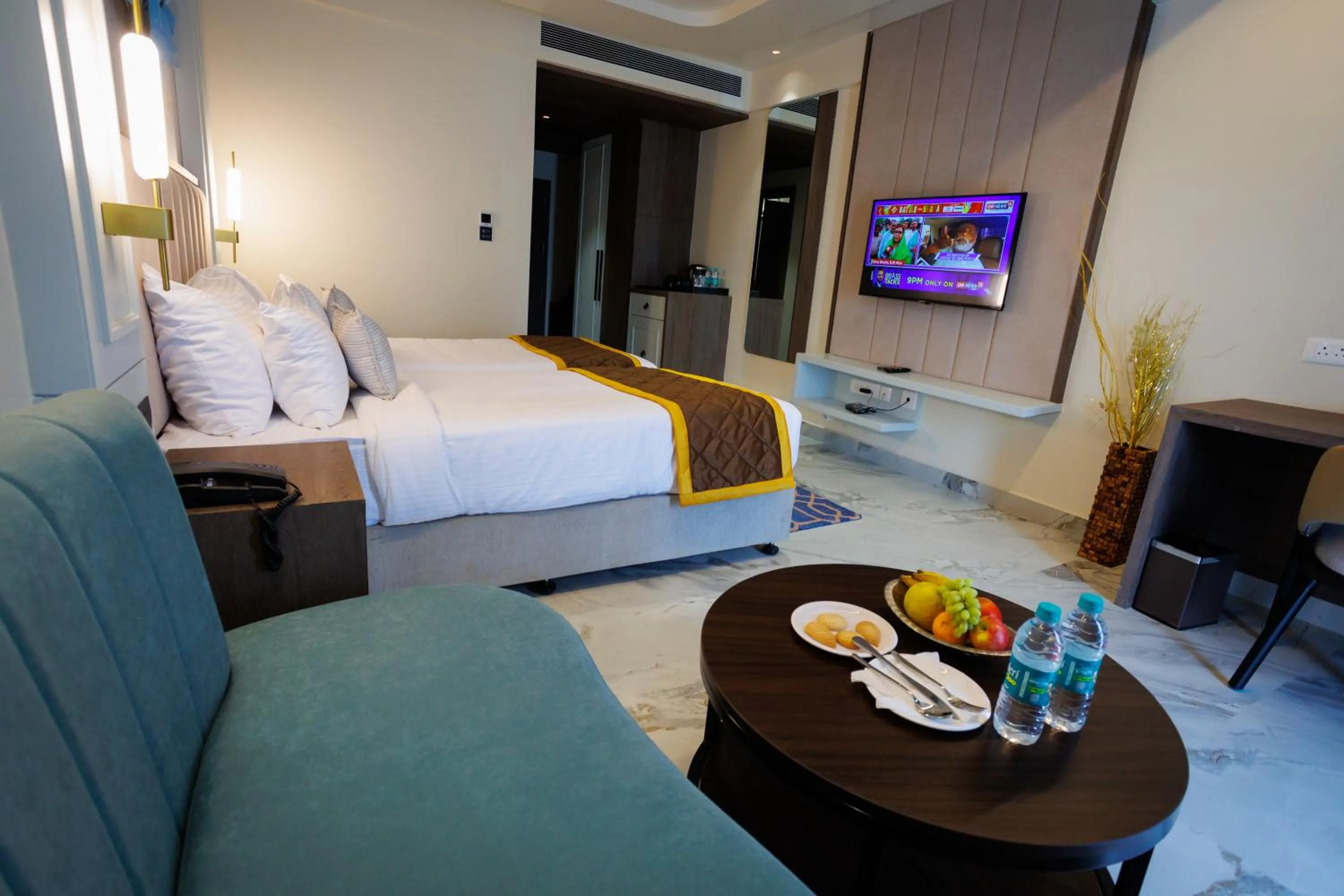 Bed in AJ GRAND ELITE HOTEL