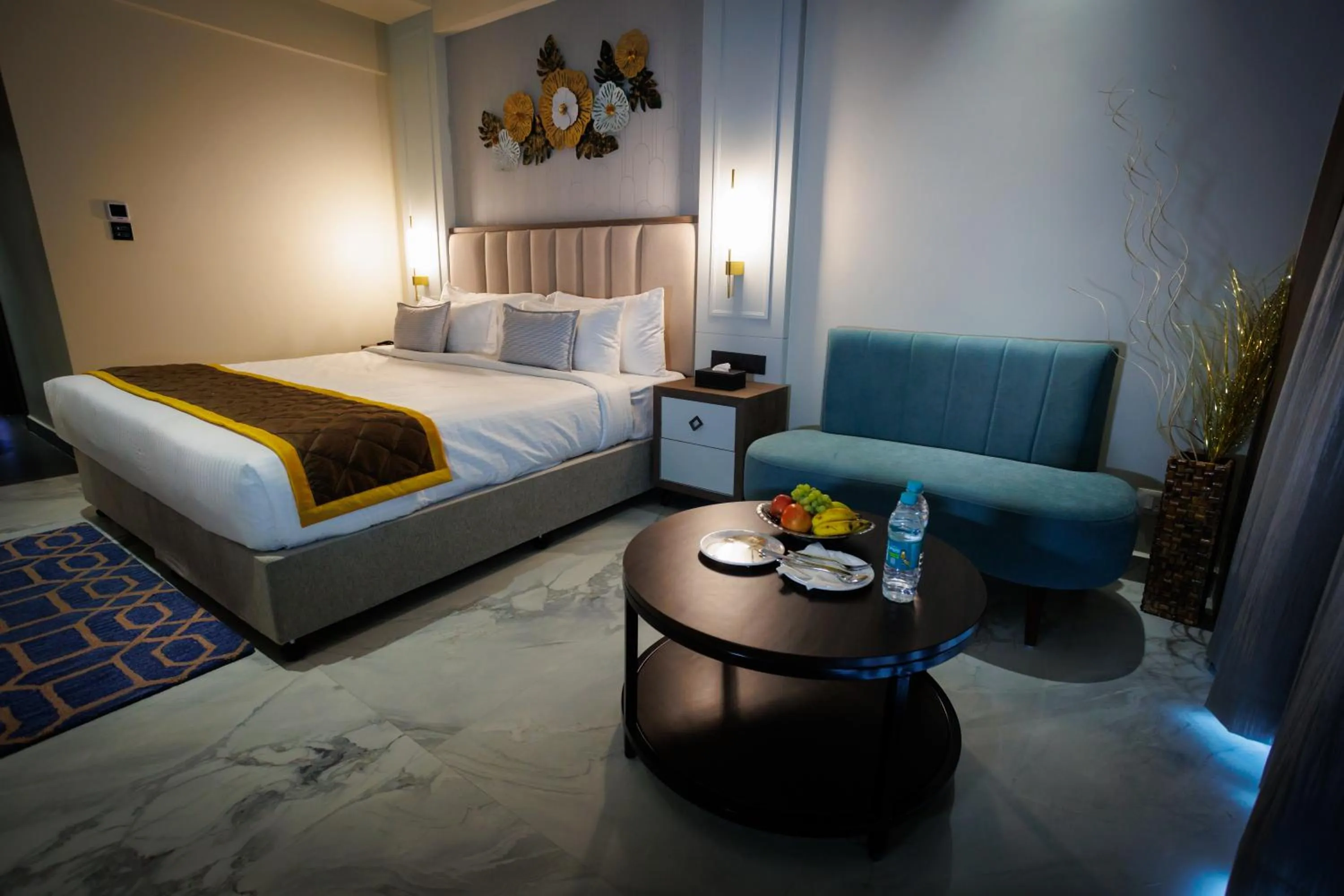 Bed in AJ GRAND ELITE HOTEL