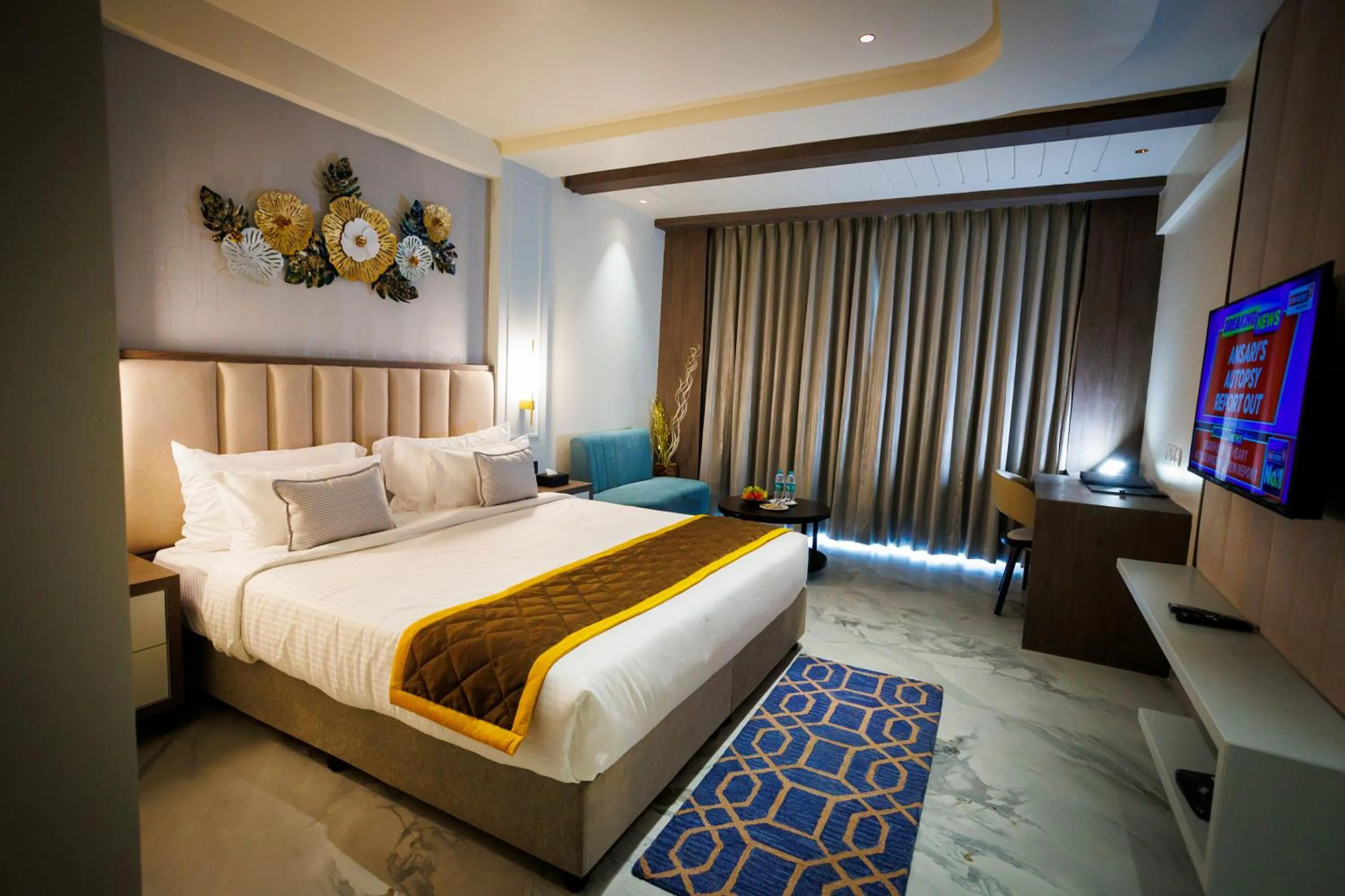 Bed in AJ GRAND ELITE HOTEL