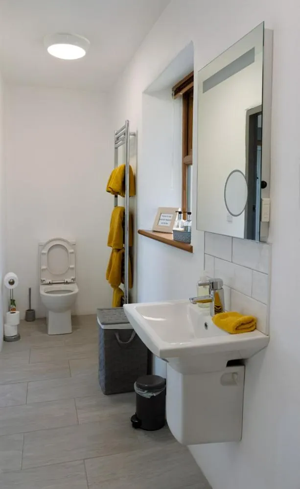 Toilet in Kinbane Self Catering Cottages - 'Makem's Cottage'