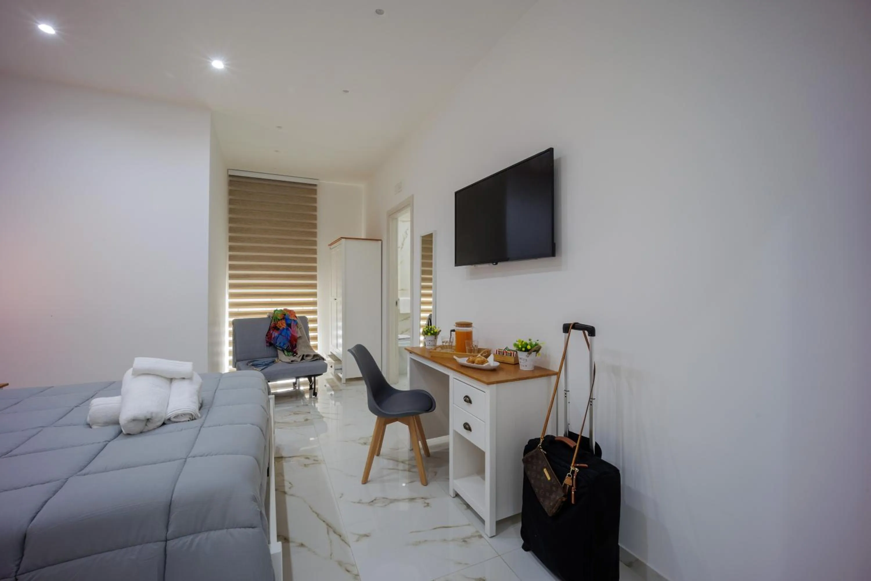 Bed in REDDIMUS Guest House