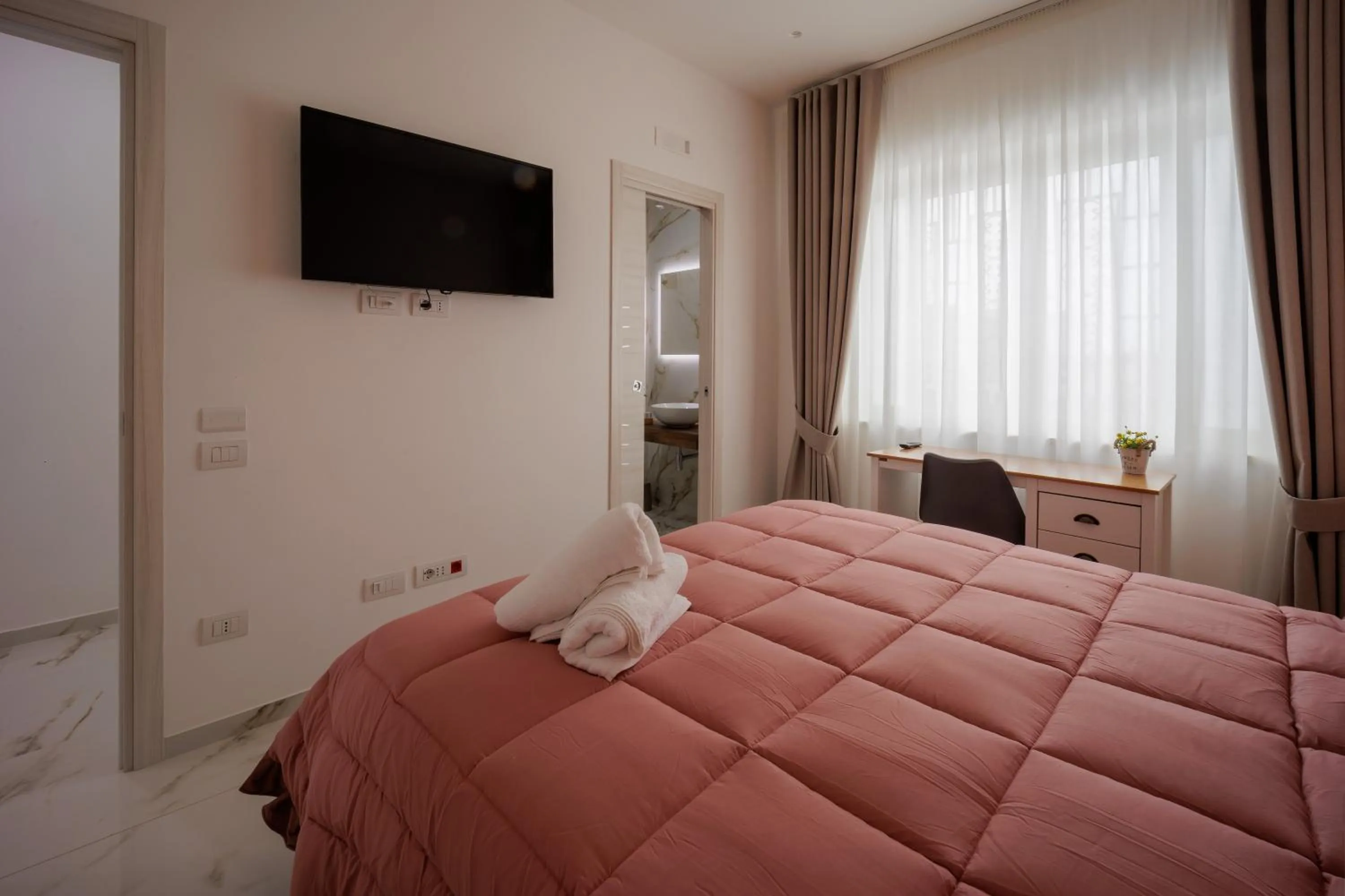 Bed in REDDIMUS Guest House