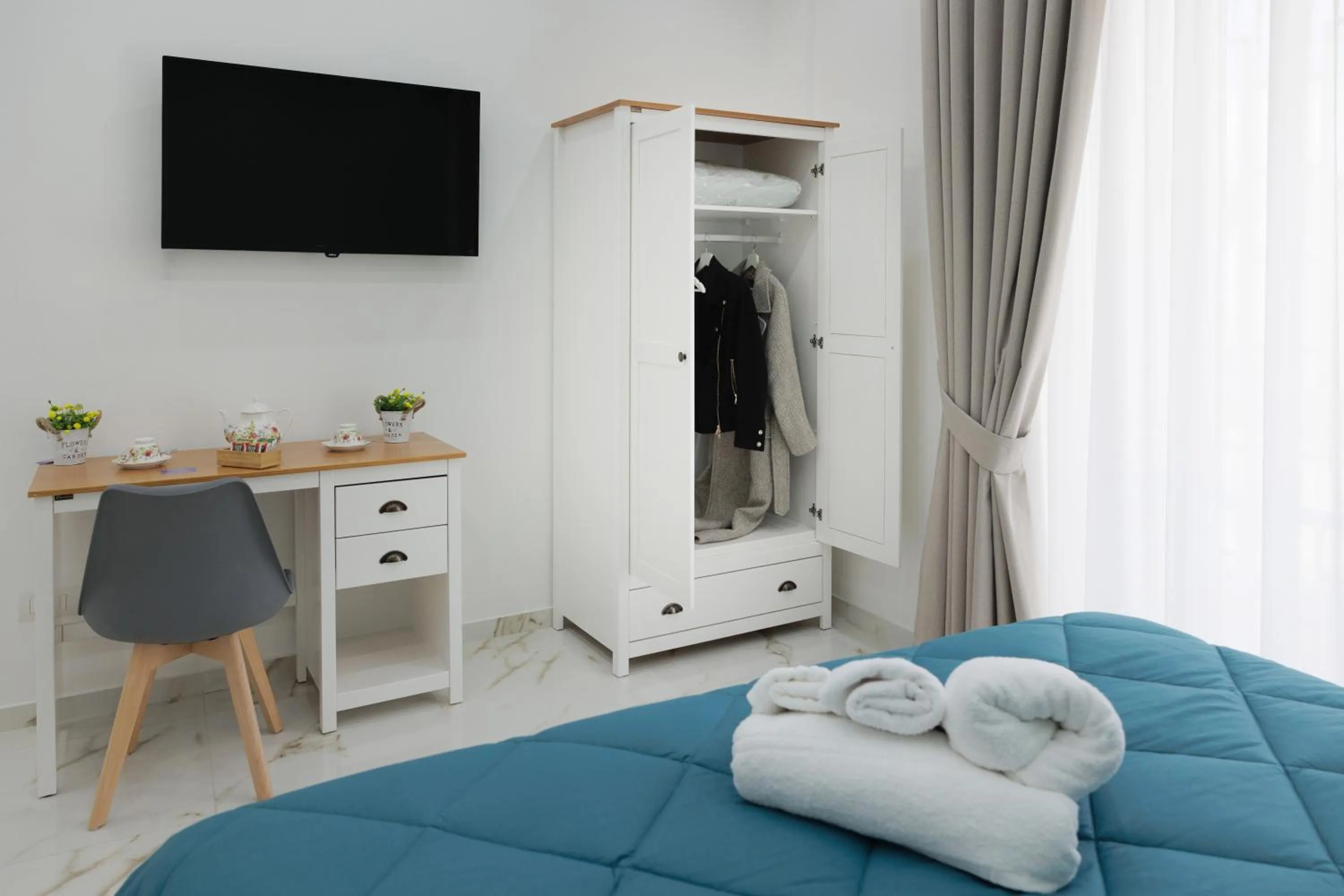 TV and multimedia, Bed in REDDIMUS Guest House