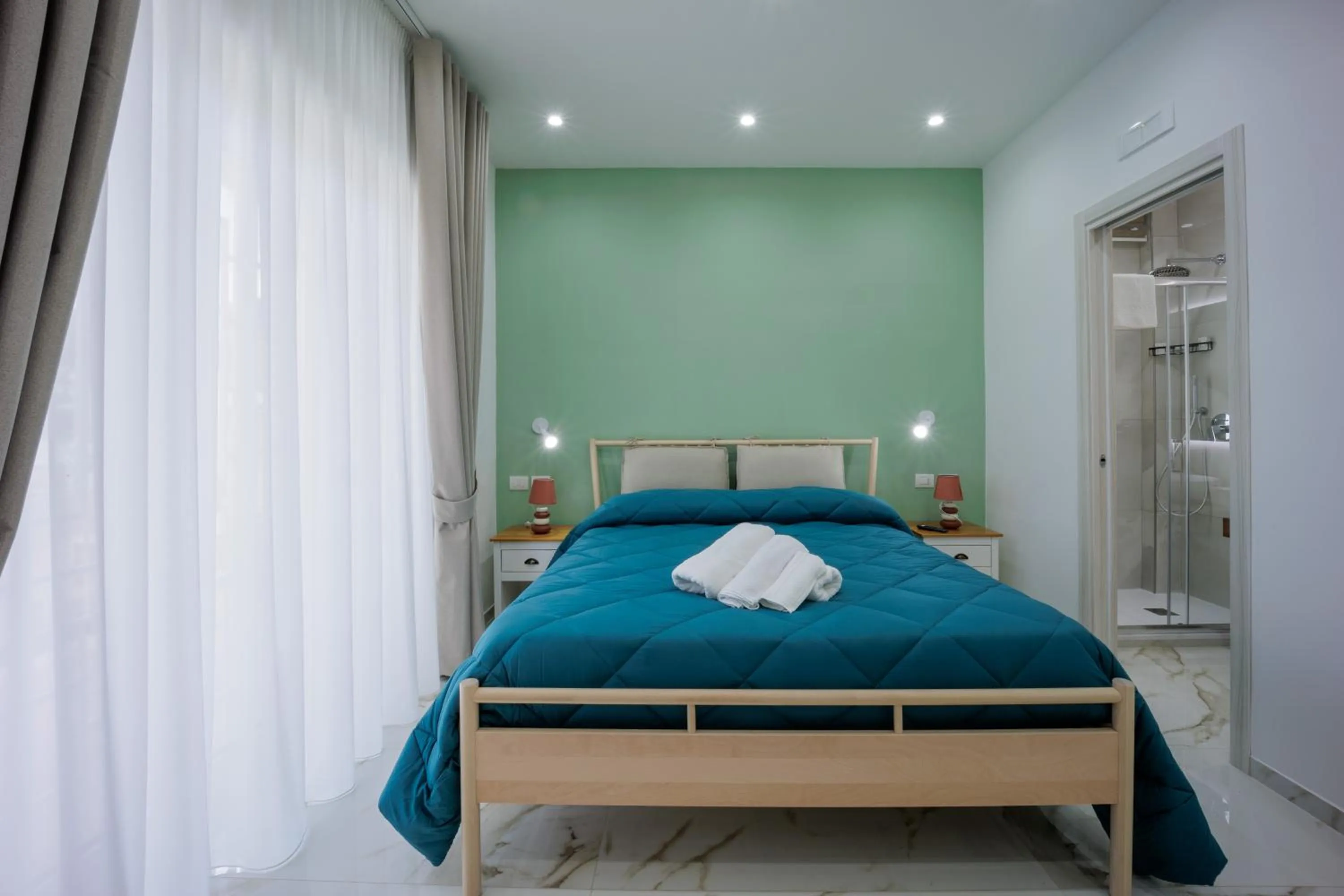 Bed in REDDIMUS Guest House