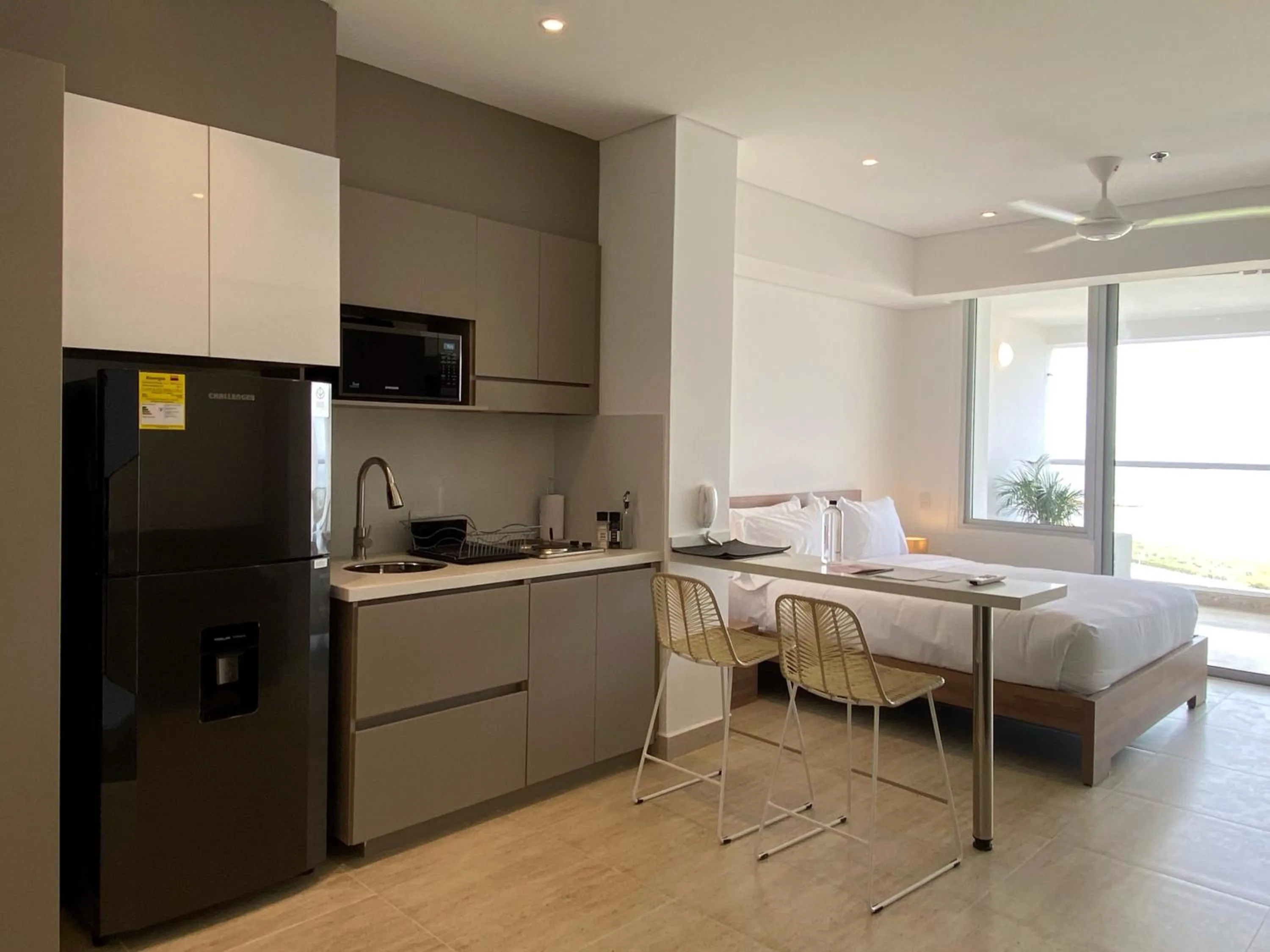 Kitchen or kitchenette, Bed in Wynwood Cartagena Beach