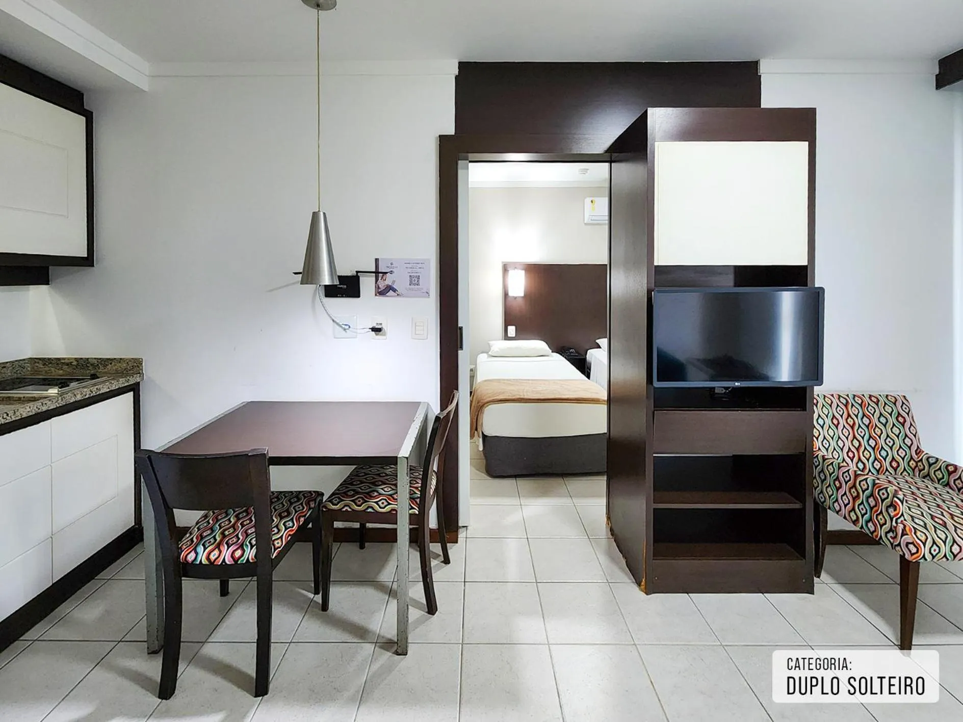 Bed in Triângulo Apart Hotel