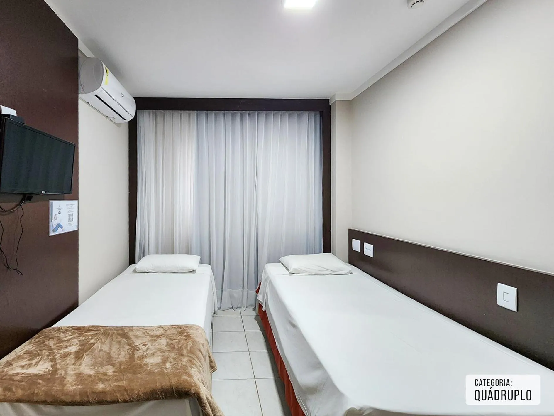 Bed in Triângulo Apart Hotel