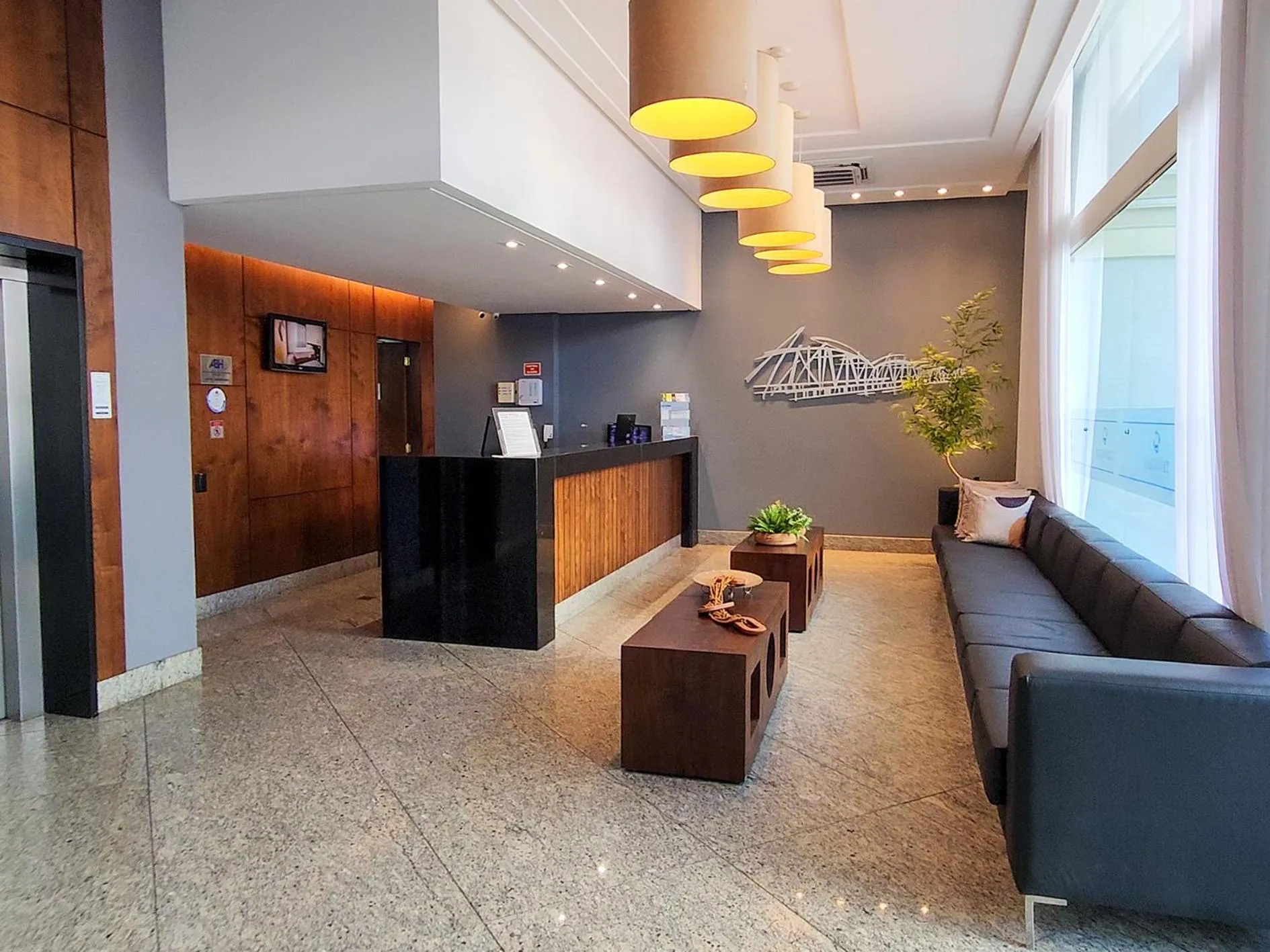 Lobby or reception in Triângulo Apart Hotel