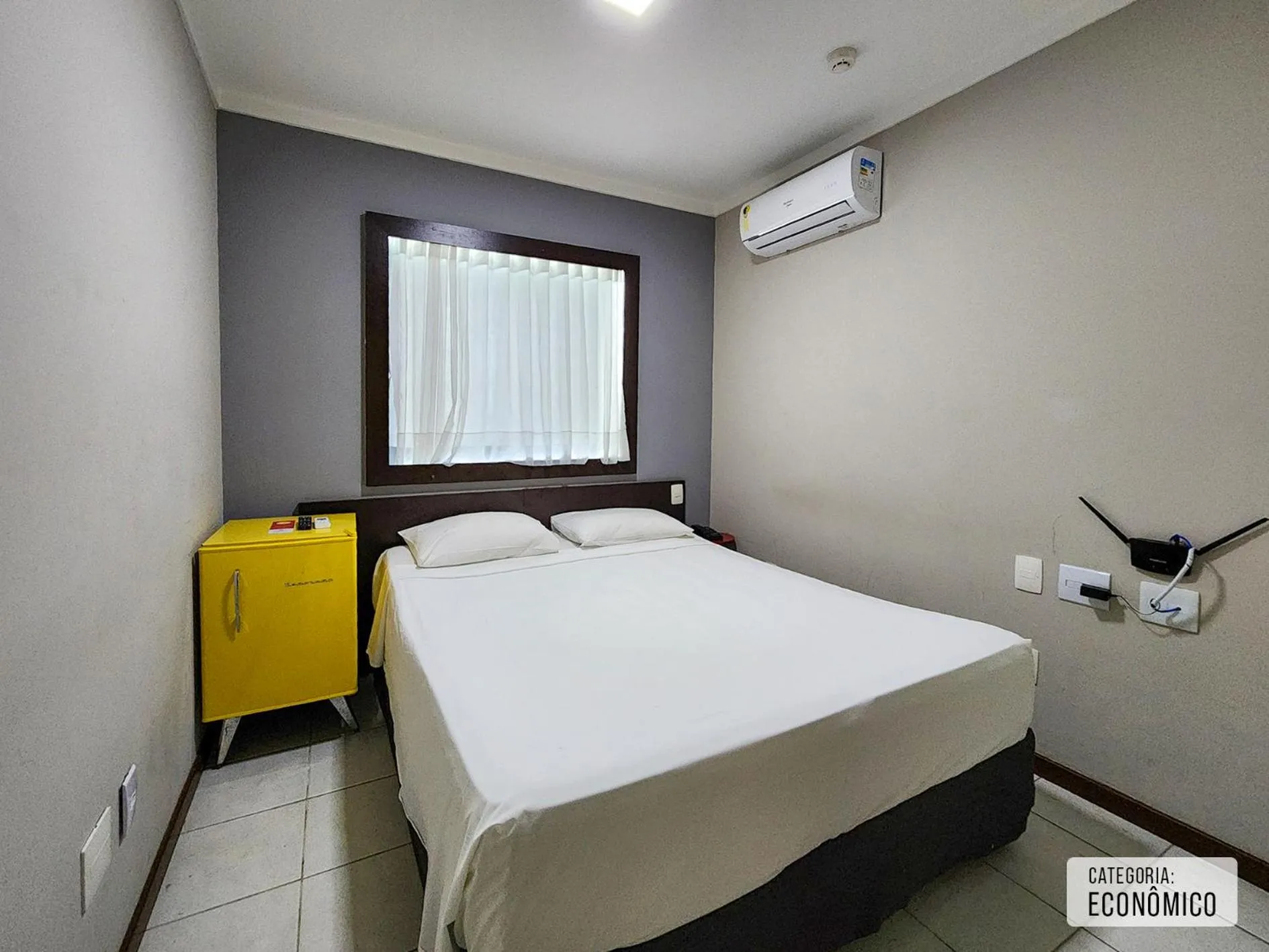 Bed in Triângulo Apart Hotel