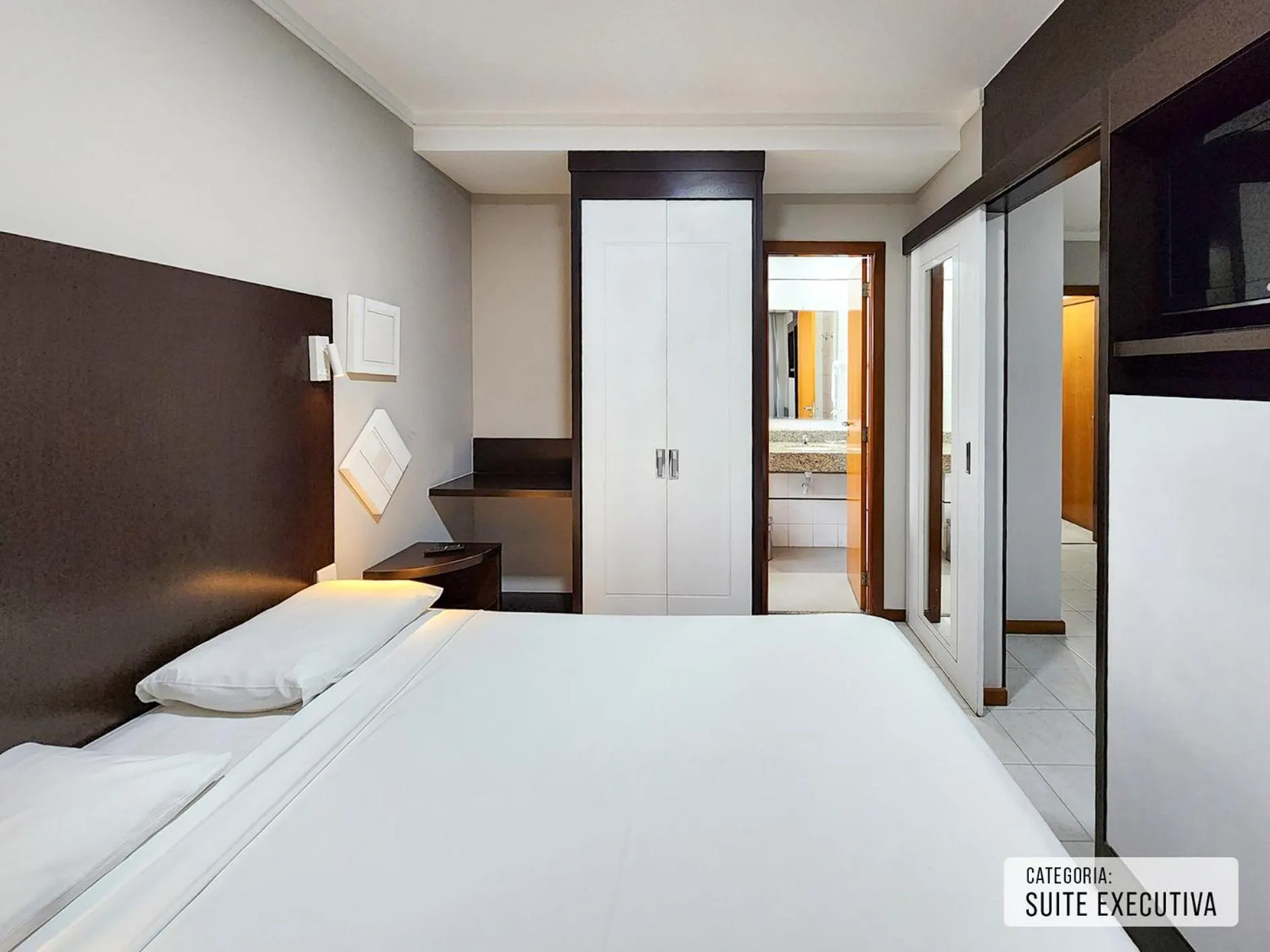 Bed in Triângulo Apart Hotel