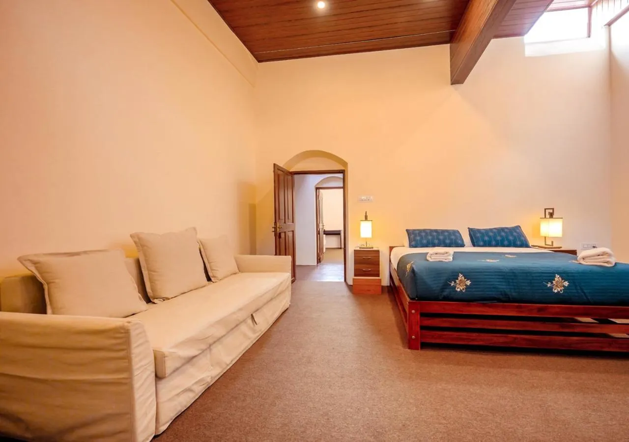 Bed in Lauriston Ooty Town Heritage Bungalow by VOYE HOMES