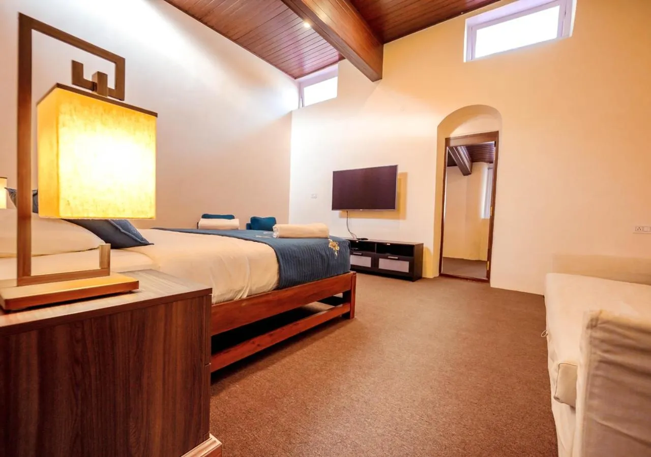 Bed in Lauriston Ooty Town Heritage Bungalow by VOYE HOMES