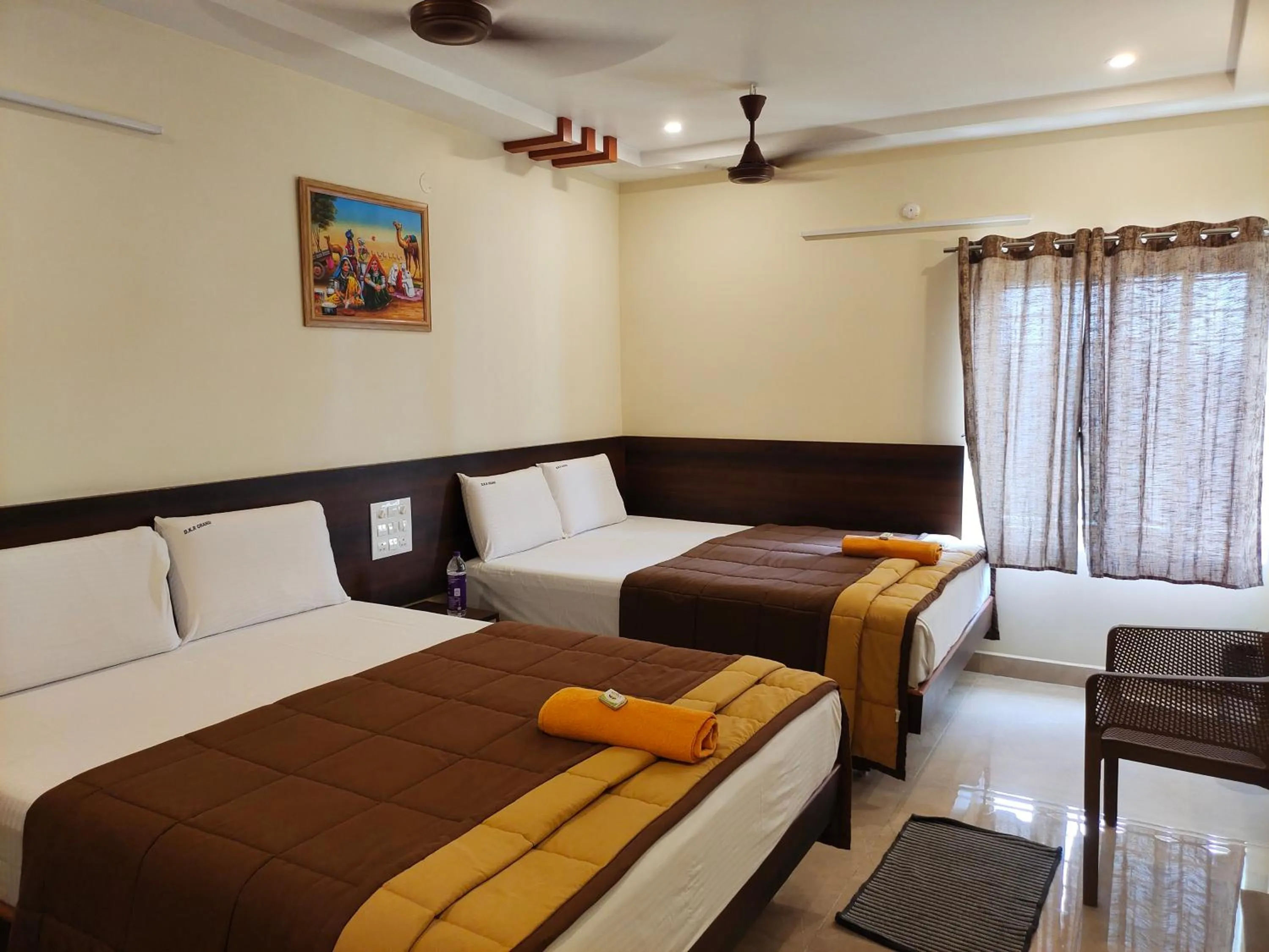 Photo of the whole room, Bed in HOTEL DKR GRAND