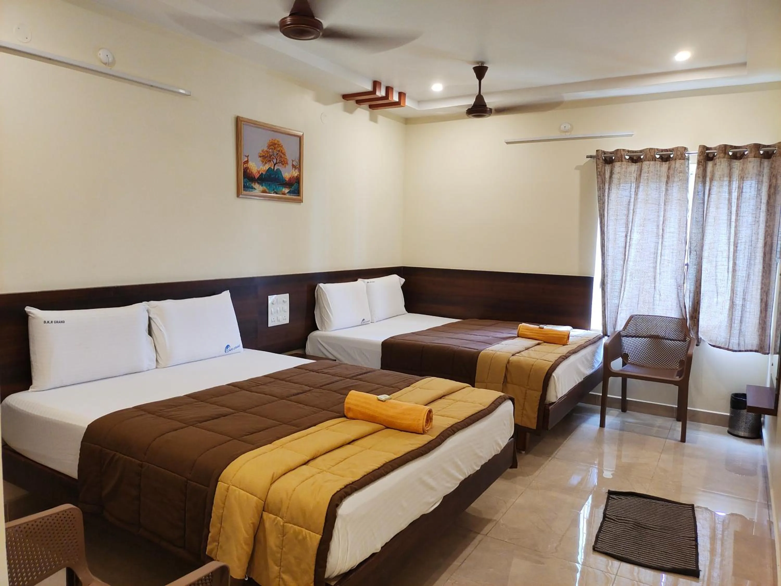 Photo of the whole room, Bed in HOTEL DKR GRAND