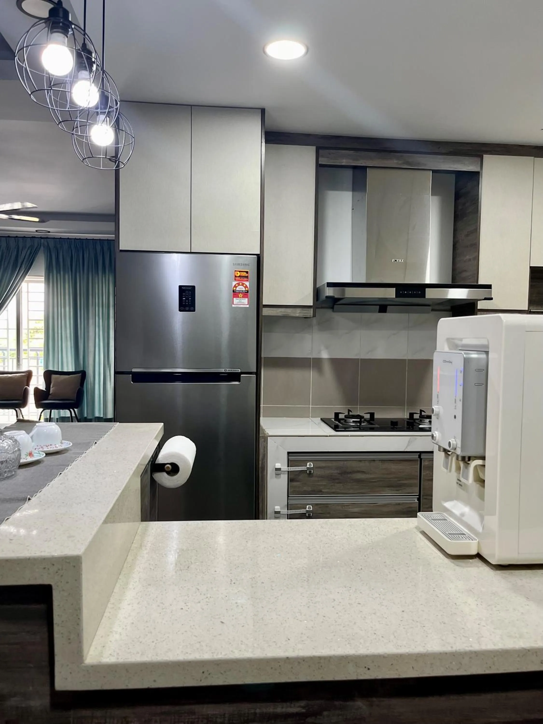 Communal kitchen in The Comfy Stay