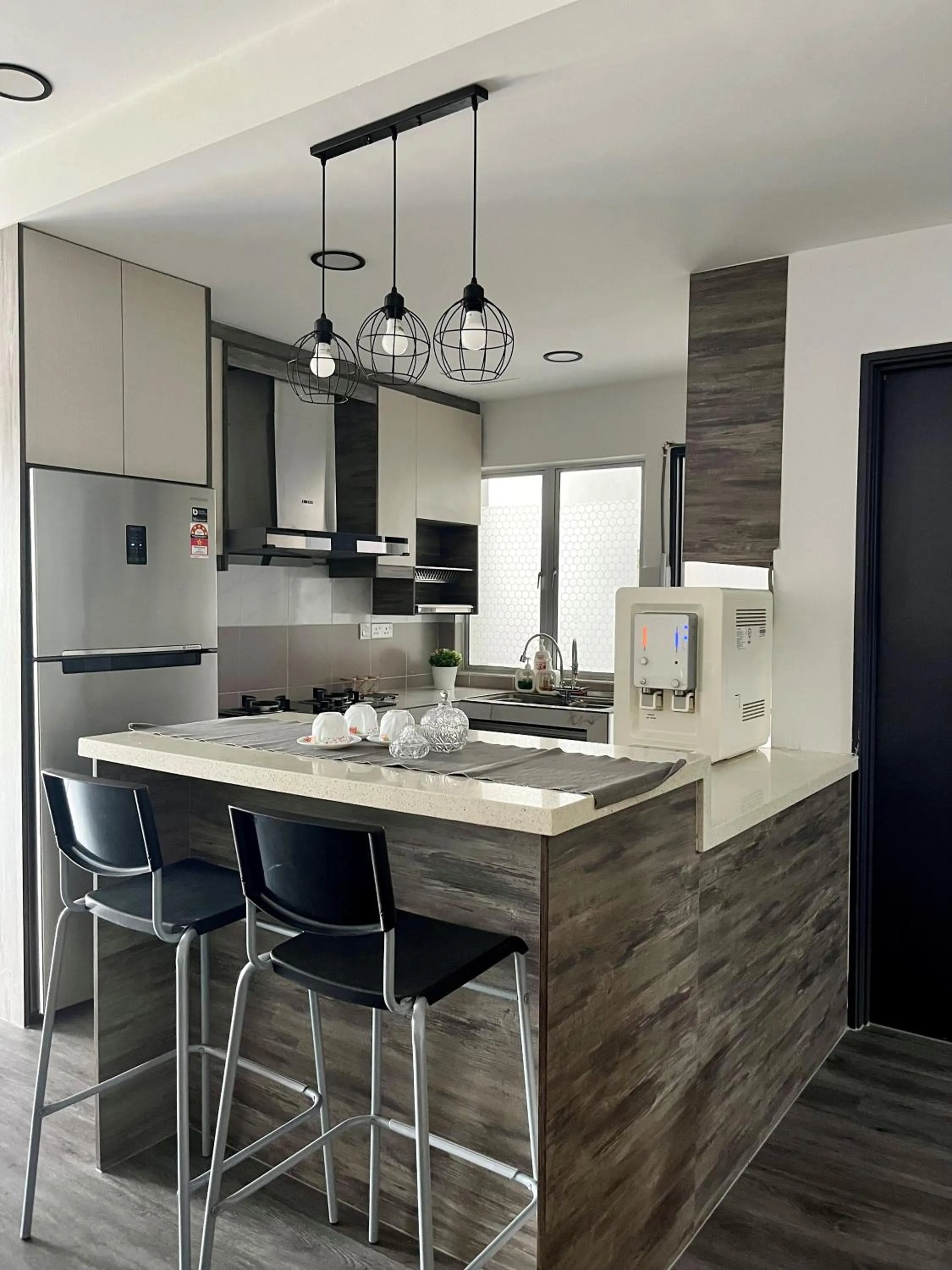 Communal kitchen in The Comfy Stay