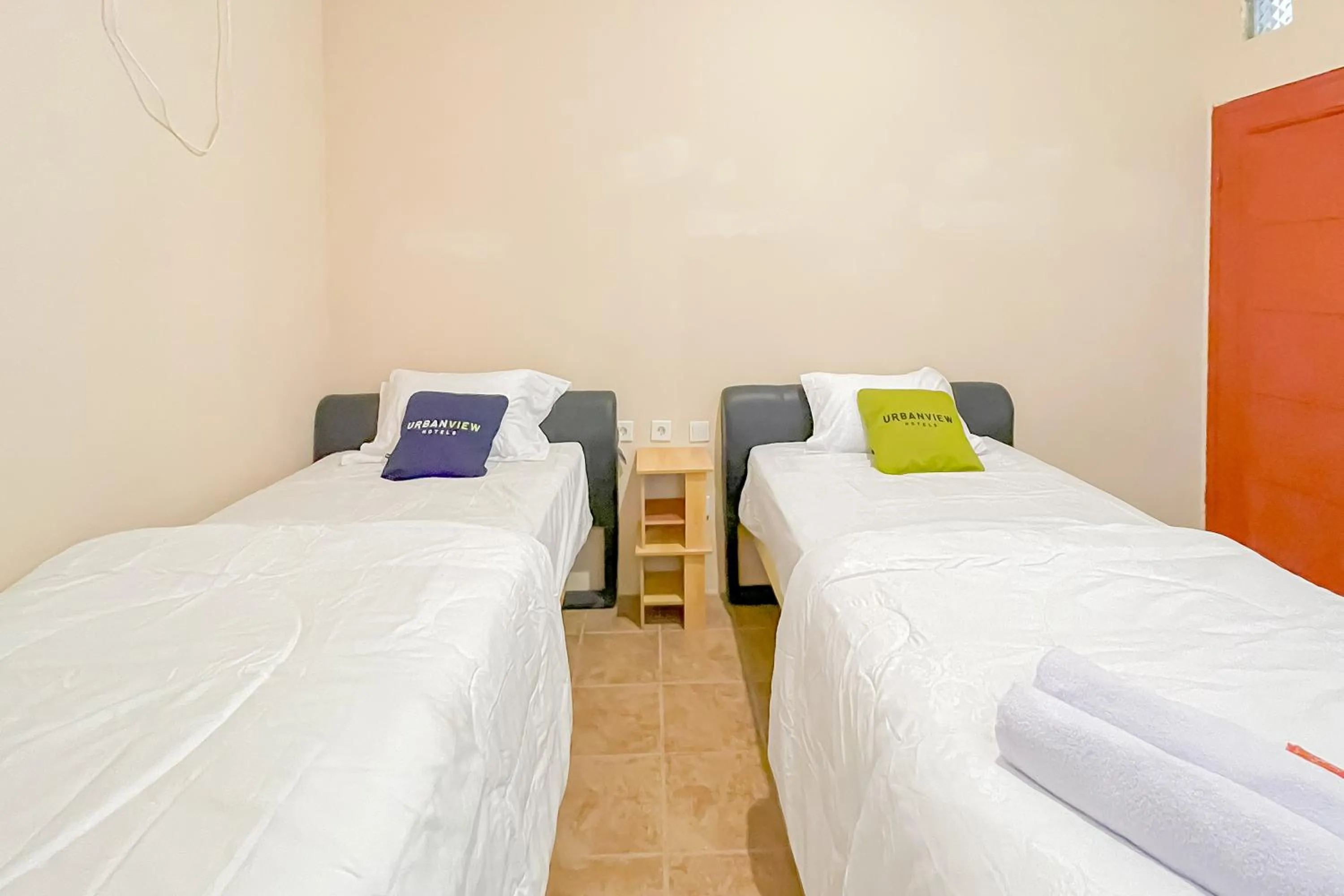 Bedroom, Bed in Urbanview Hotel Sany Cirebon