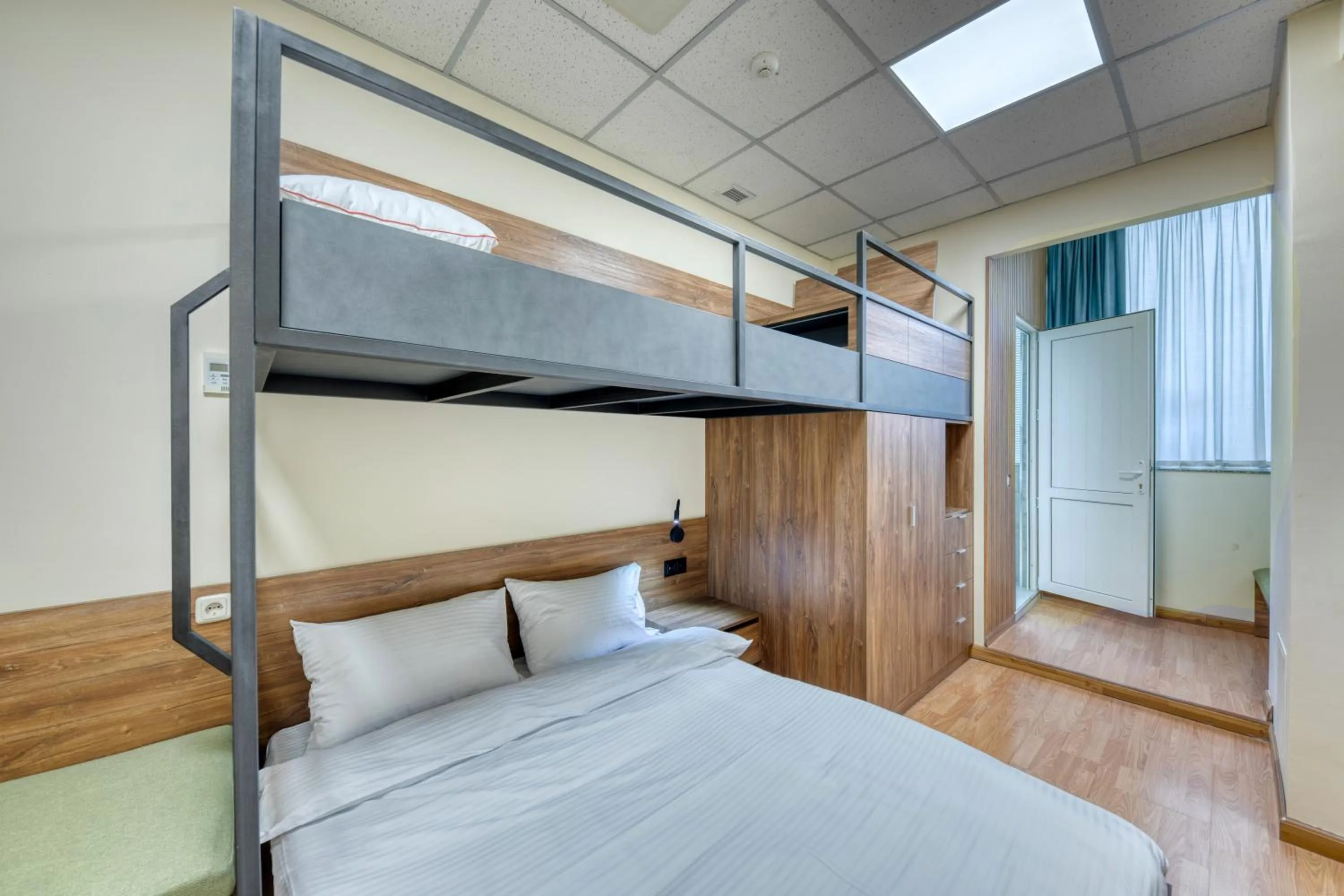 Bed in Tropica Inn Hotel