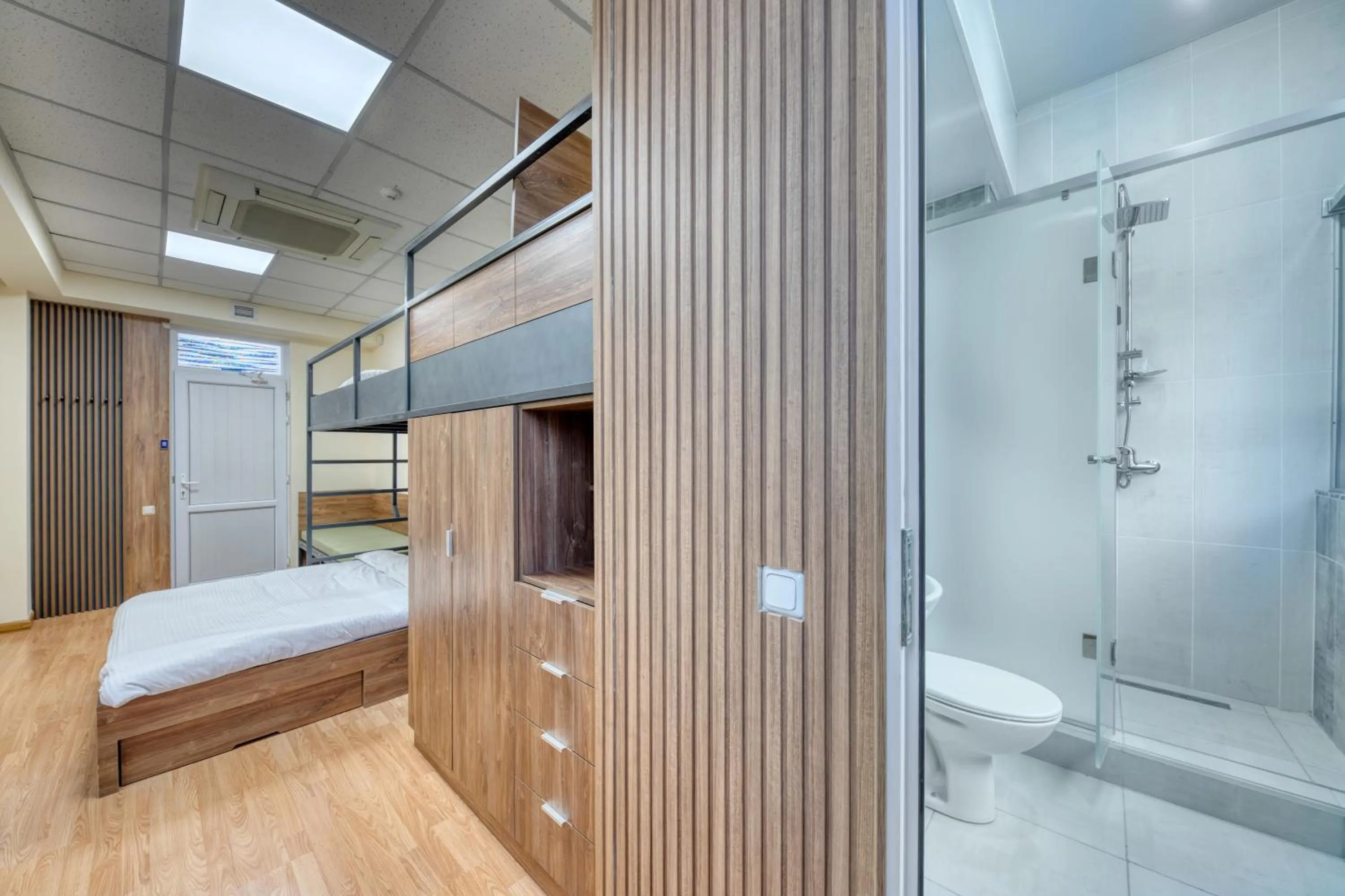 Shower, Bed in Tropica Inn Hotel