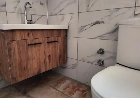 Toilet in White Bay Resort