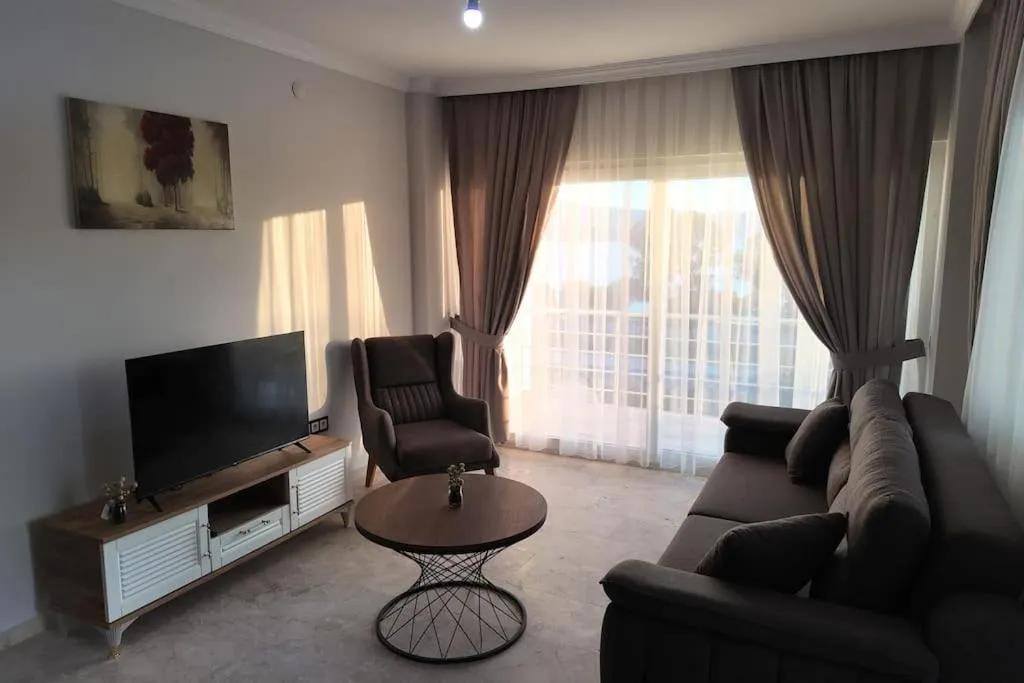 Communal lounge/ TV room in White Bay Resort