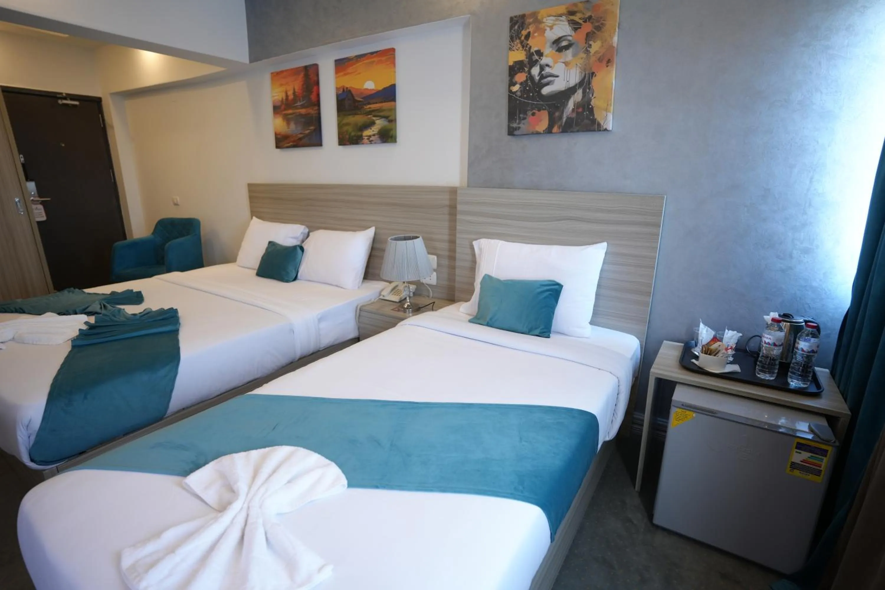 Bed in Mar Charbel Hotel Cairo