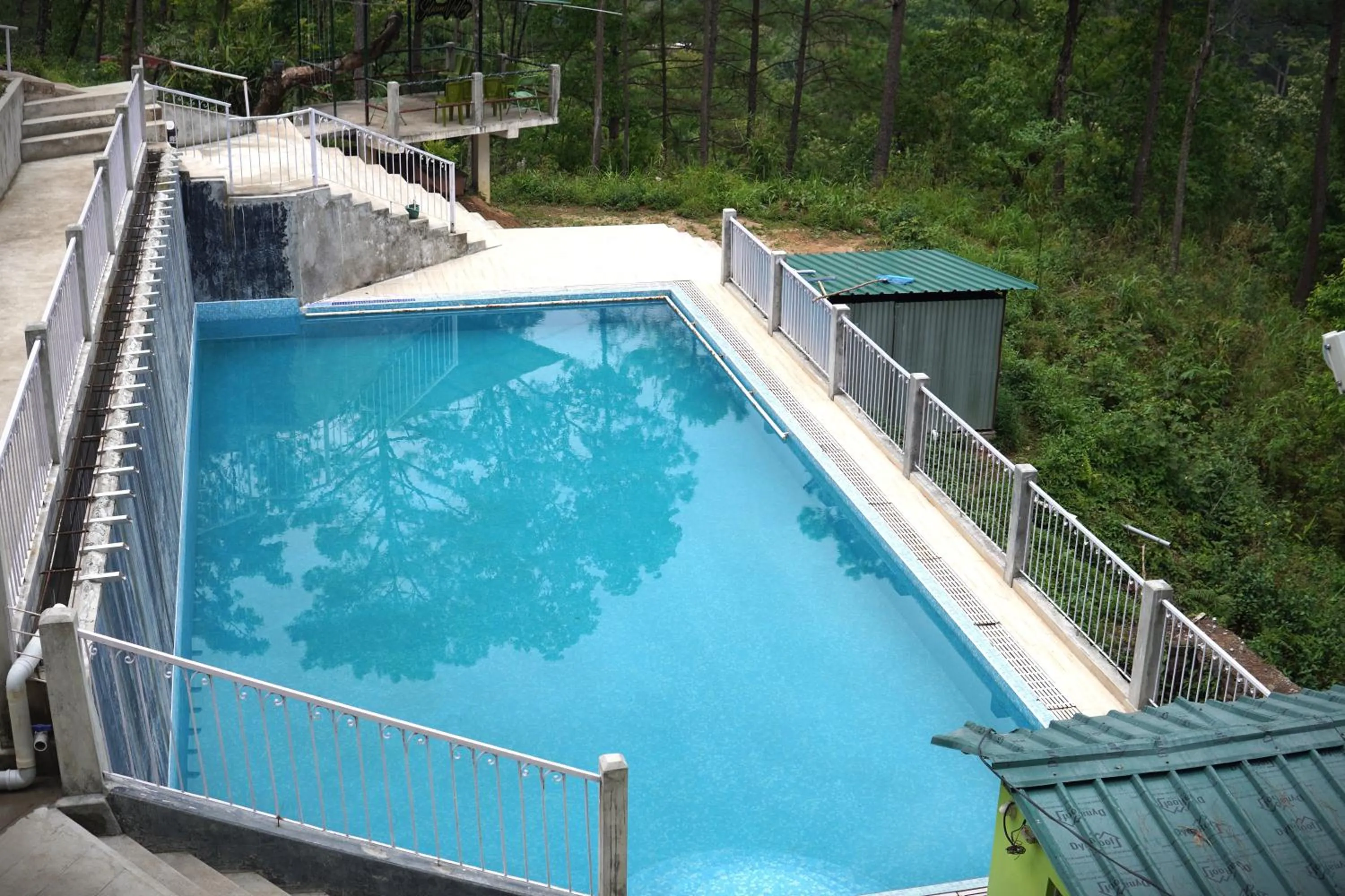 Swimming pool in ROYALTY GLOBAL HOMESTAY