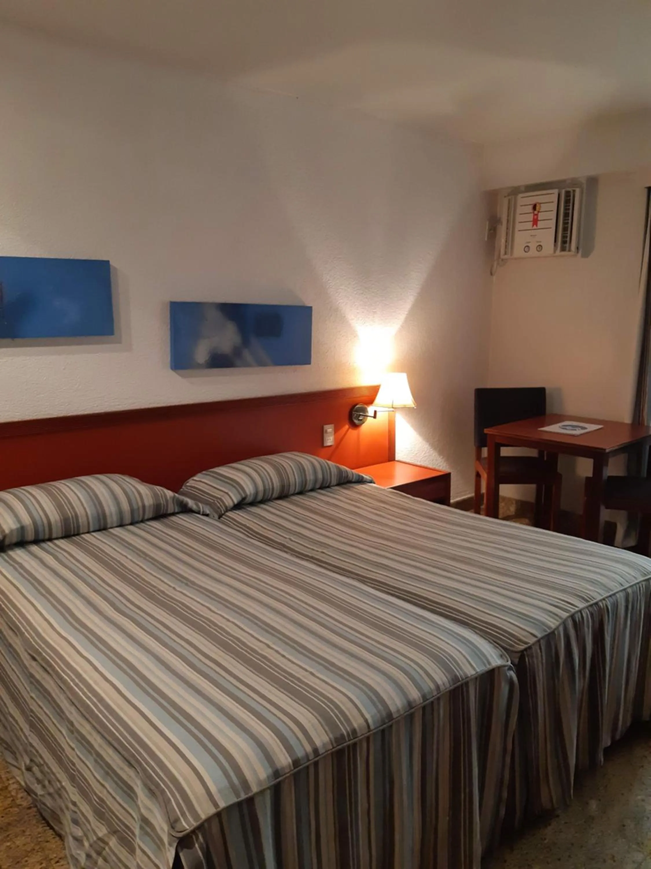 Bed in Oceano Copacabana Hotel