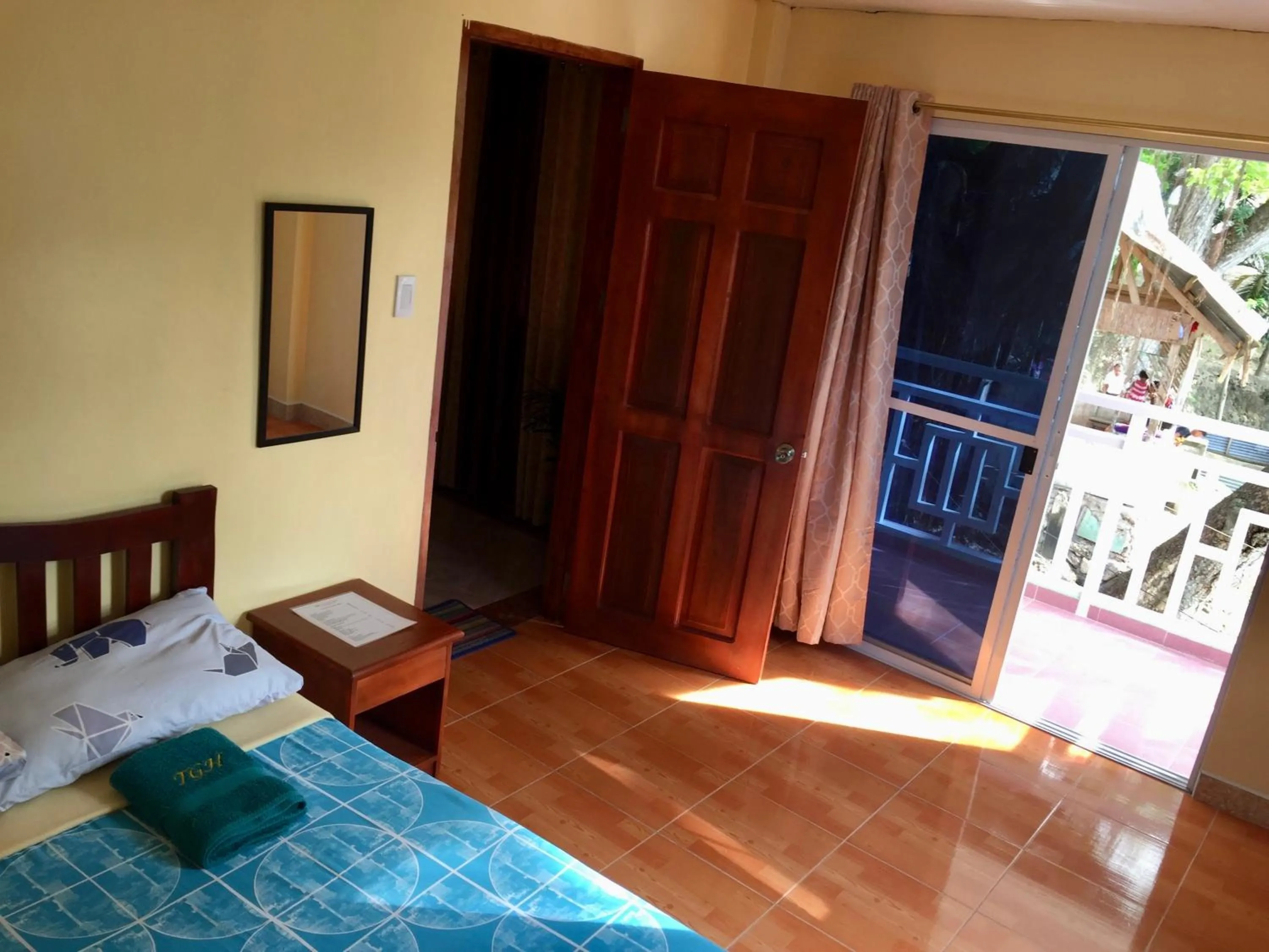 Balcony/Terrace, Bed in TGH Guest House Badian
