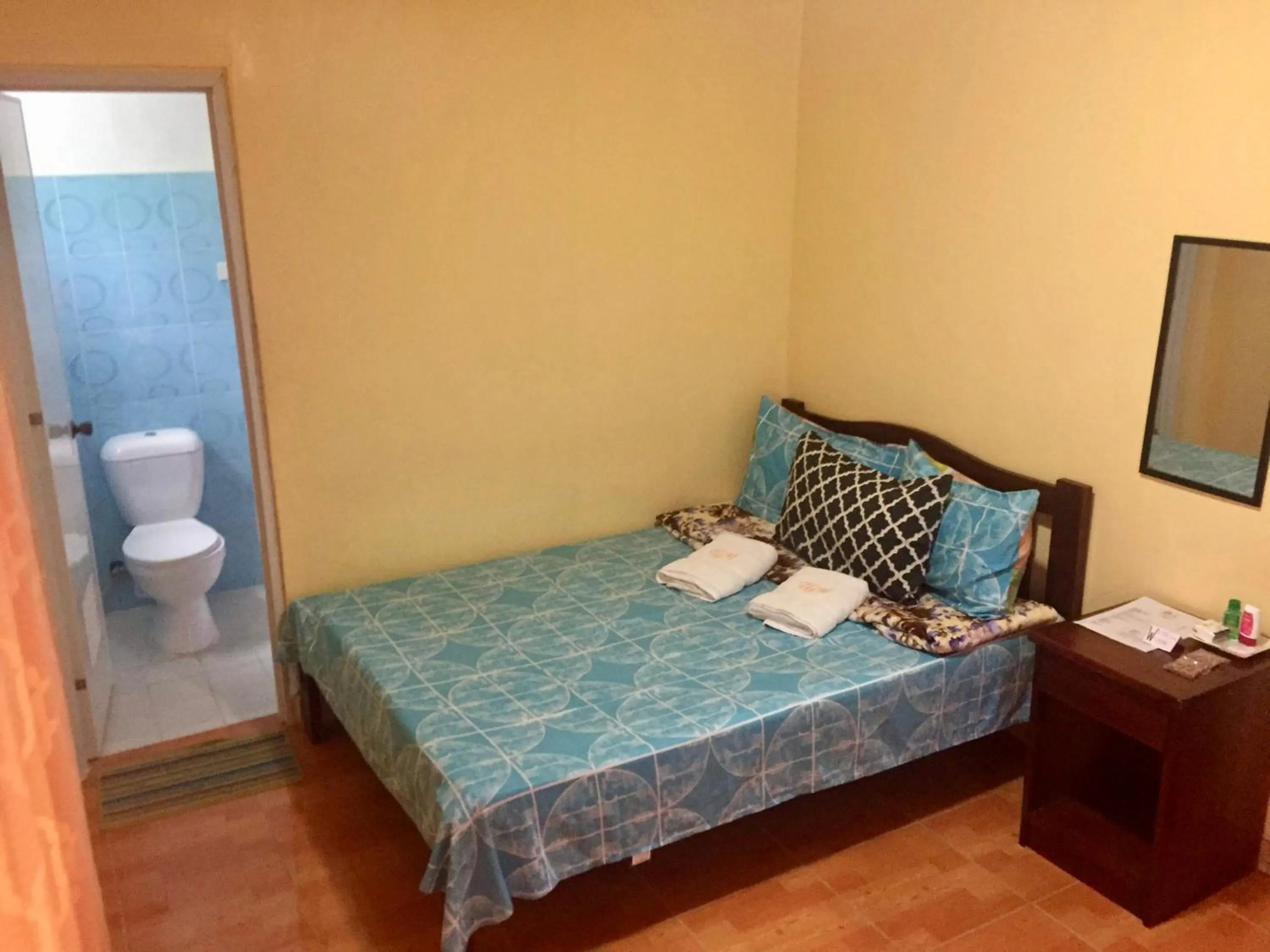 Toilet, Bed in TGH Guest House Badian