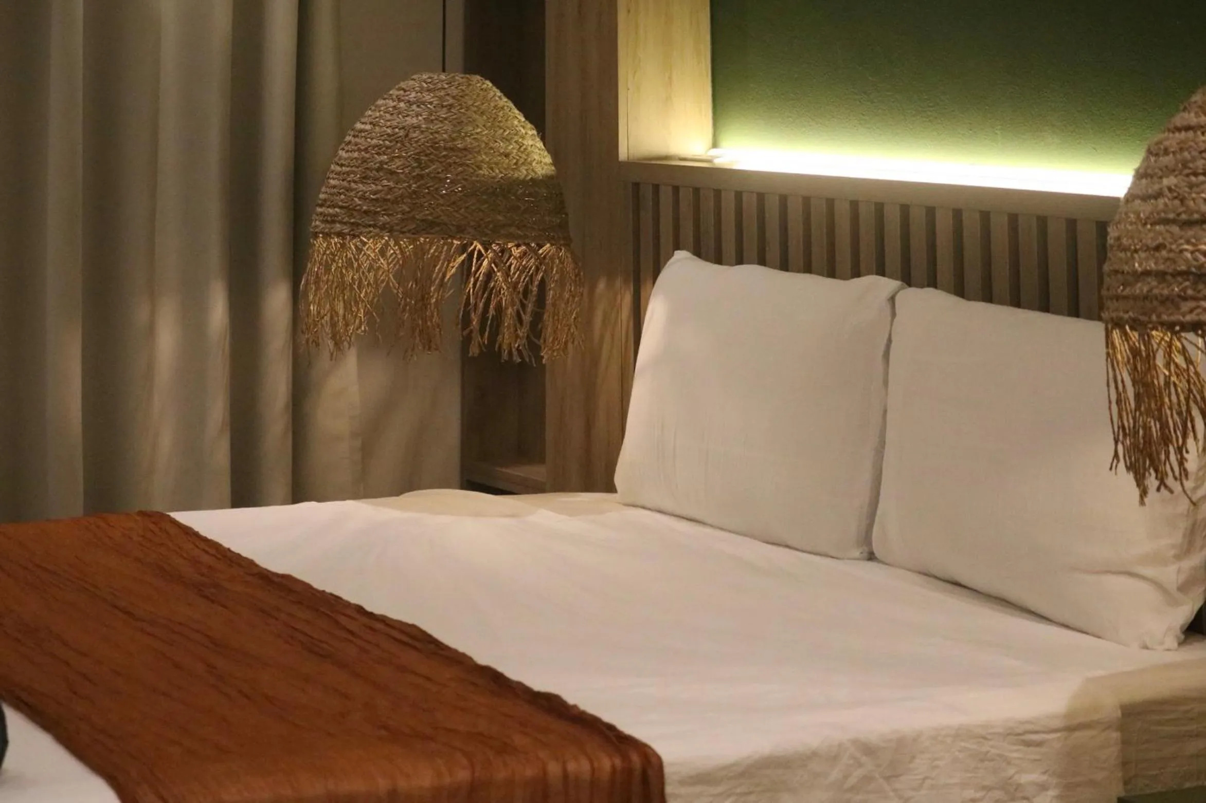 Bed in The Urban Westlake Apartment