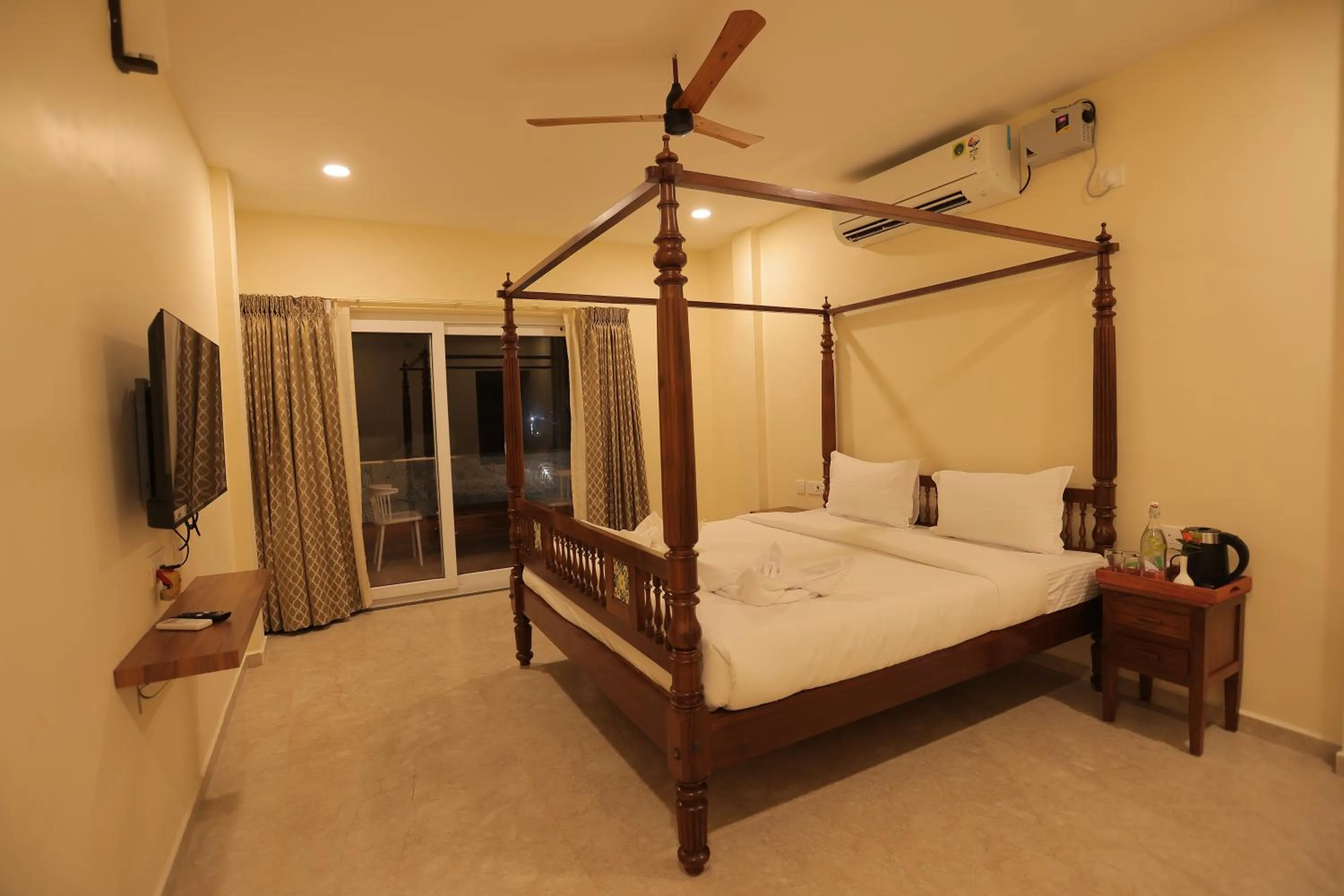 Bed in PALM PARADISE Beach Resort