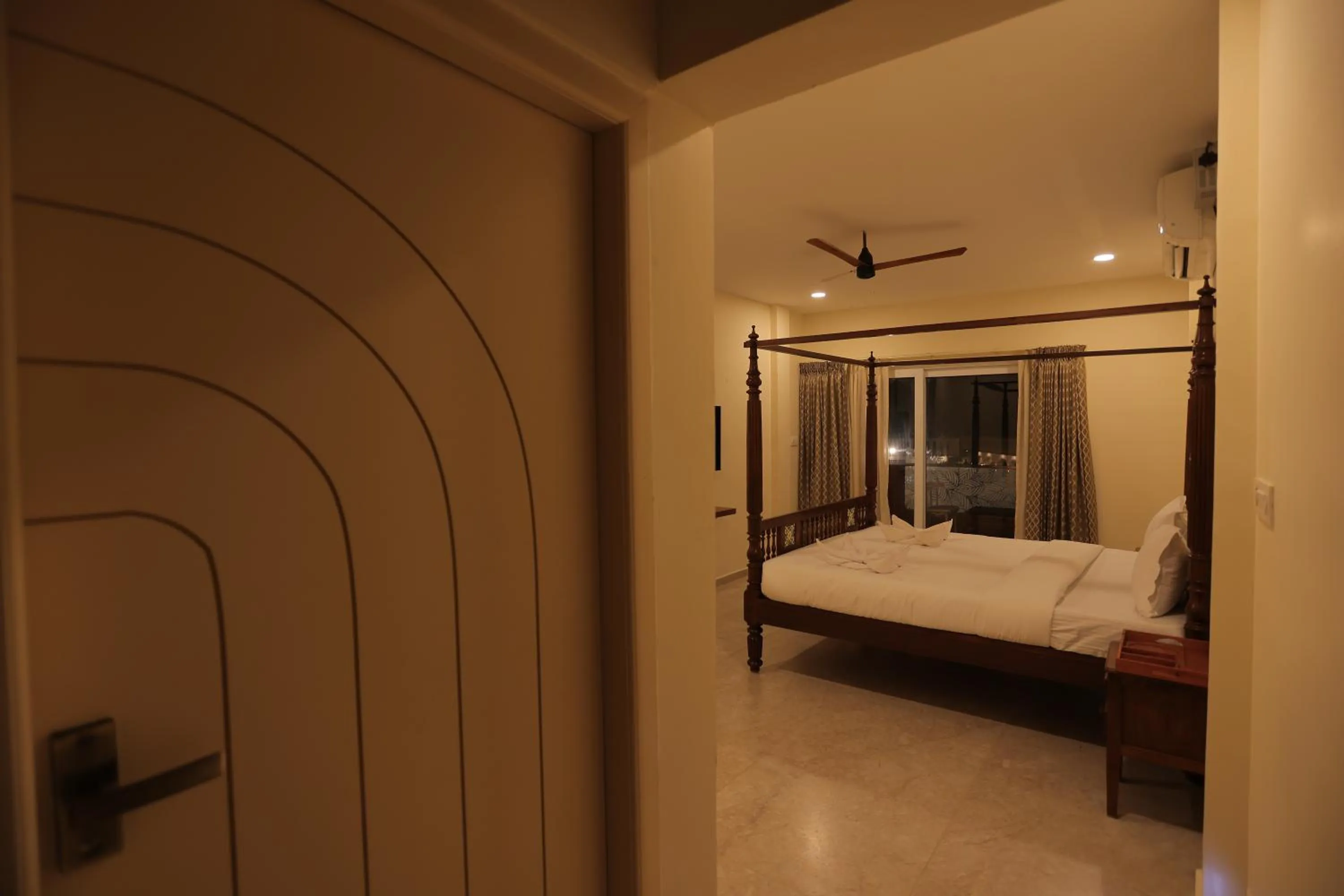 Bed in PALM PARADISE Beach Resort