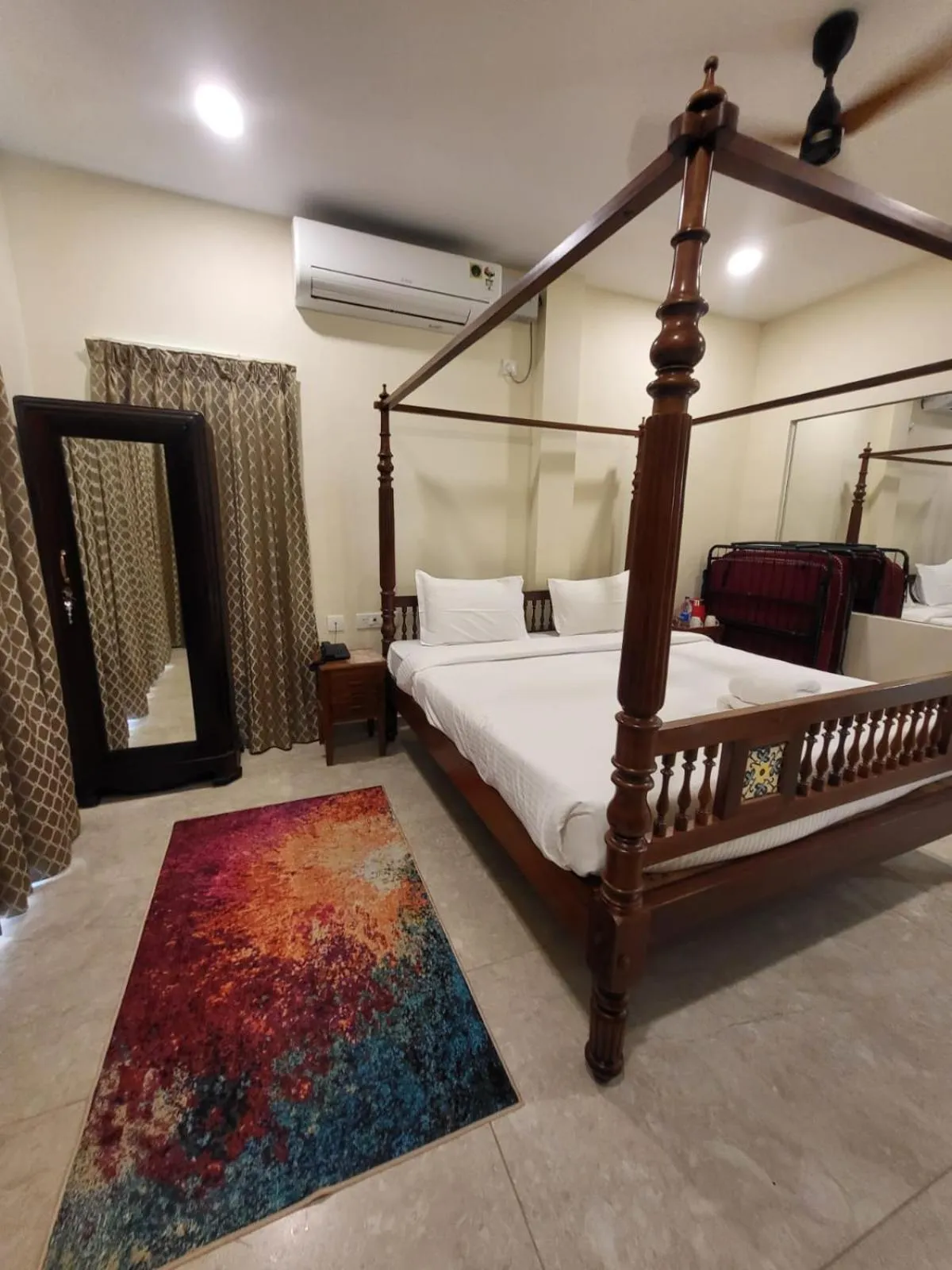 Bed in PALM PARADISE Beach Resort