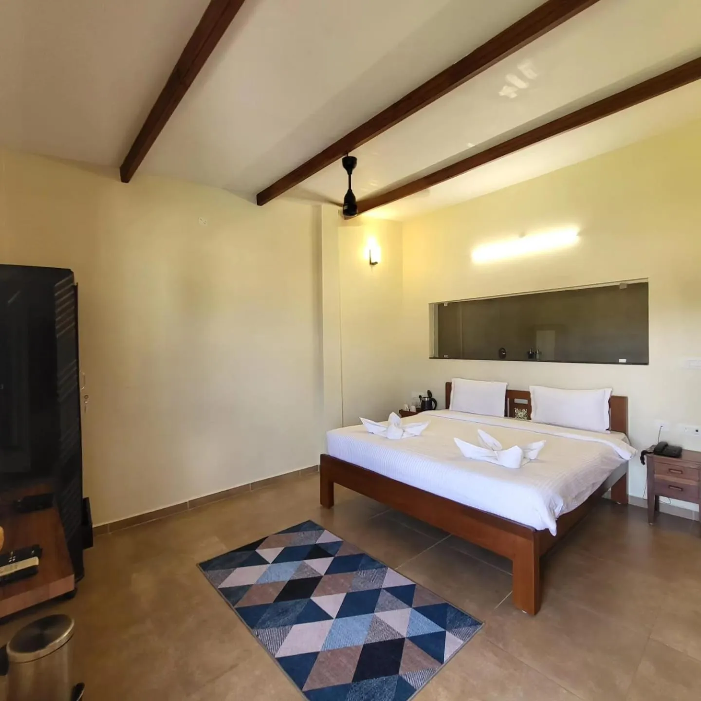 Bed in PALM PARADISE Beach Resort