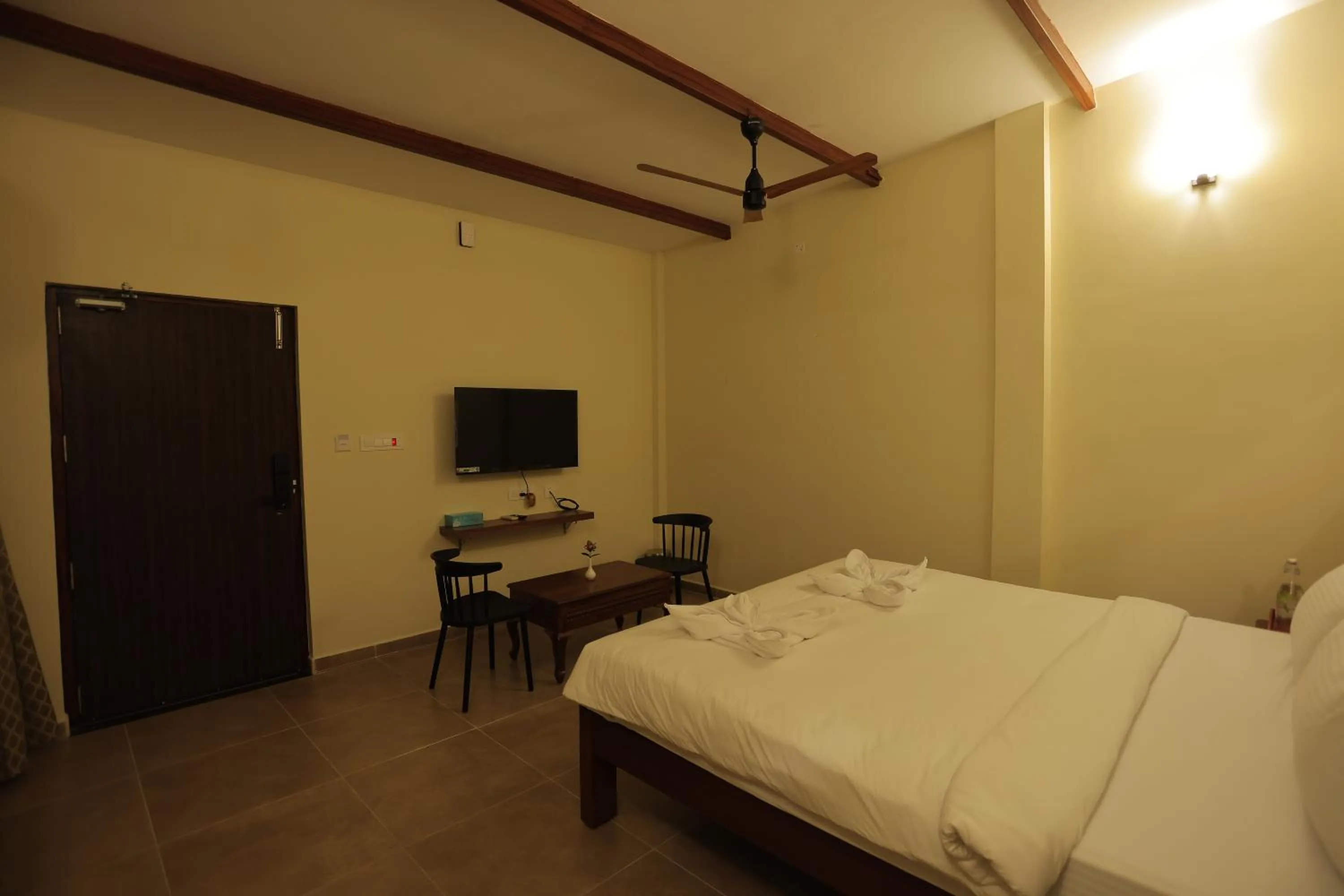 Bed in PALM PARADISE Beach Resort