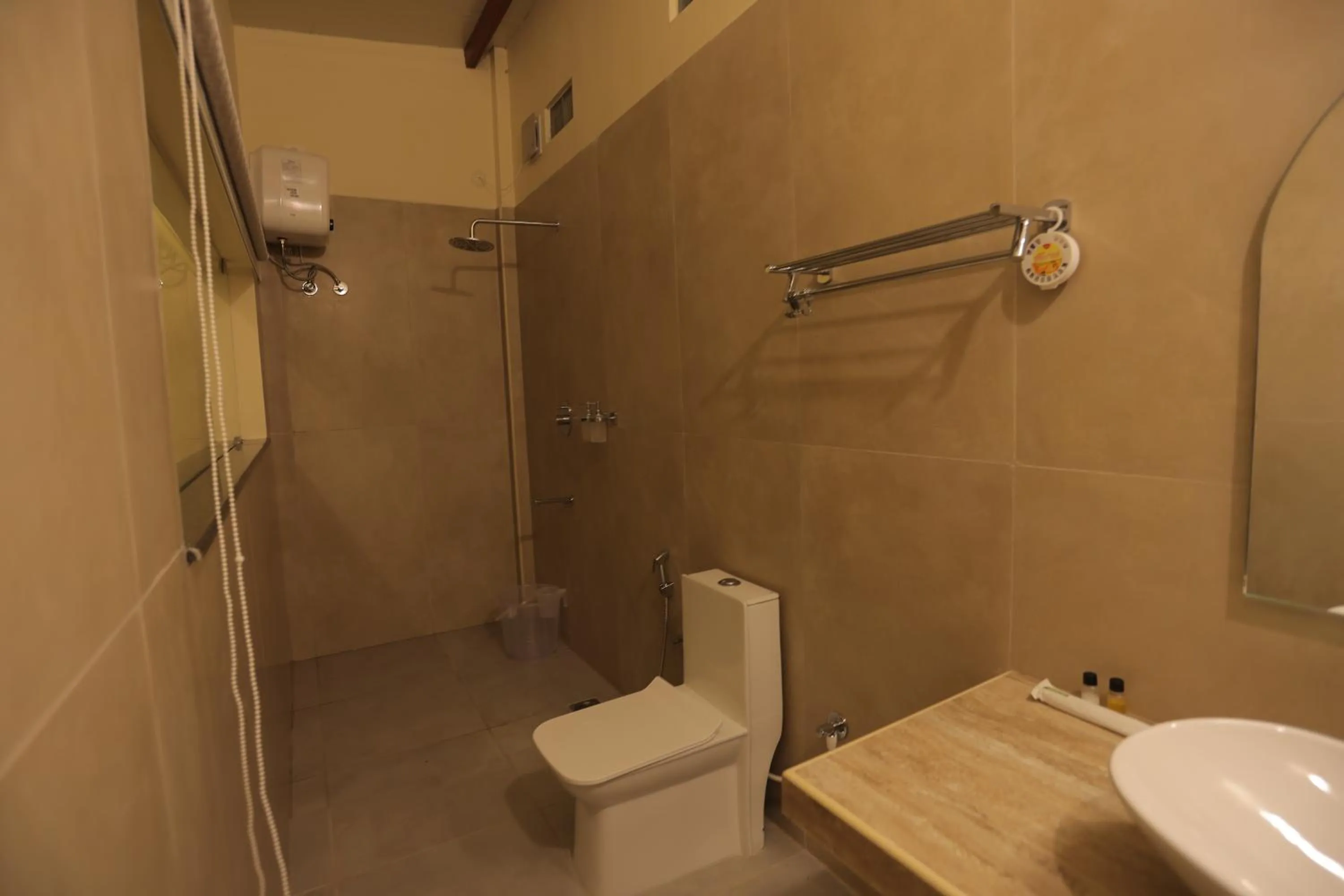 Toilet in PALM PARADISE Beach Resort