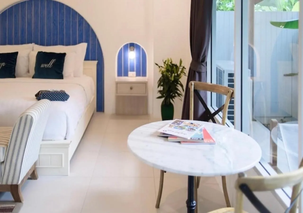 Seating area, Bed in Costa Village Jacuzzi Bangsaray