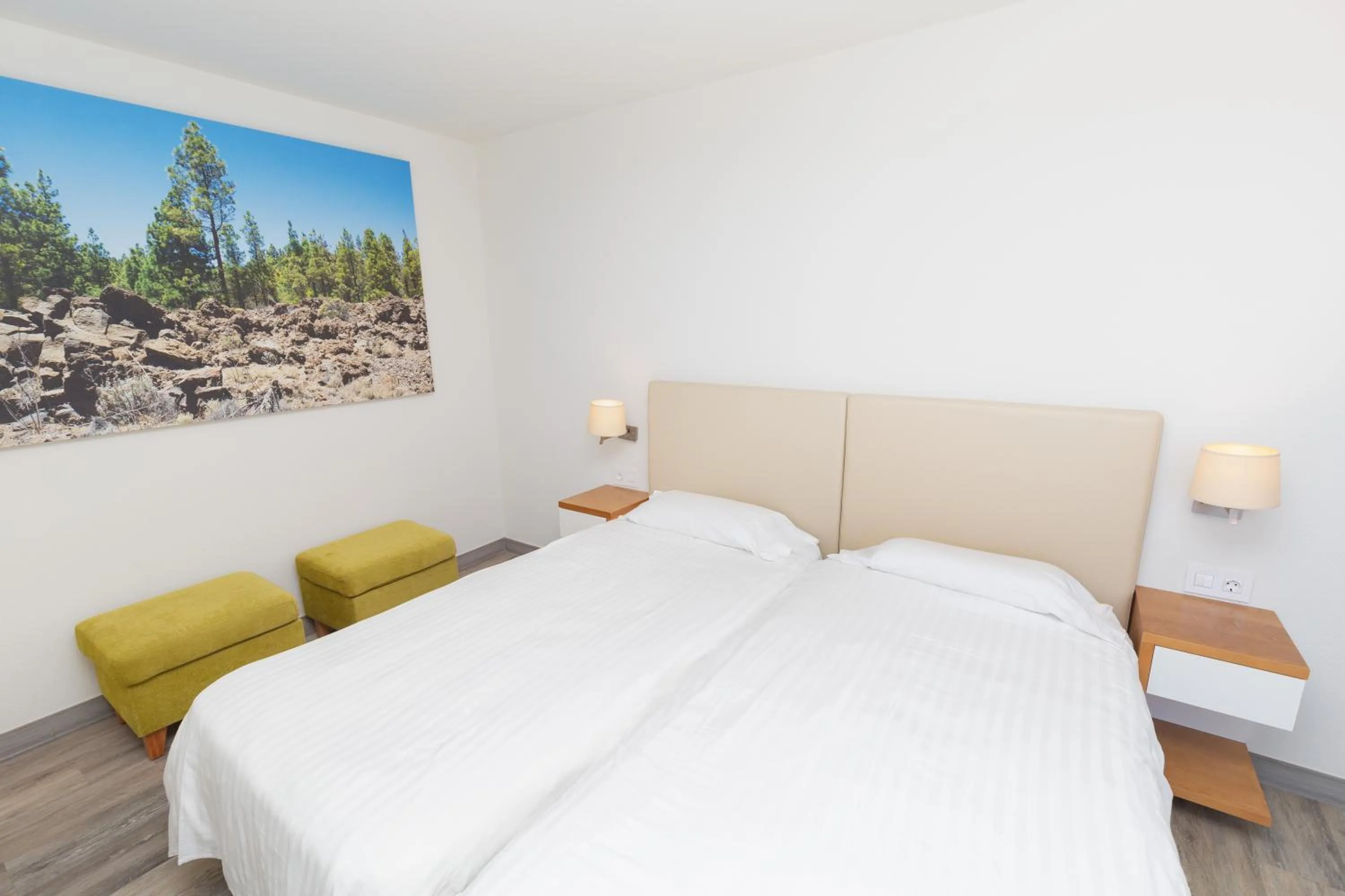 Bedroom, Bed in Apartamentos Tigaiga Suites