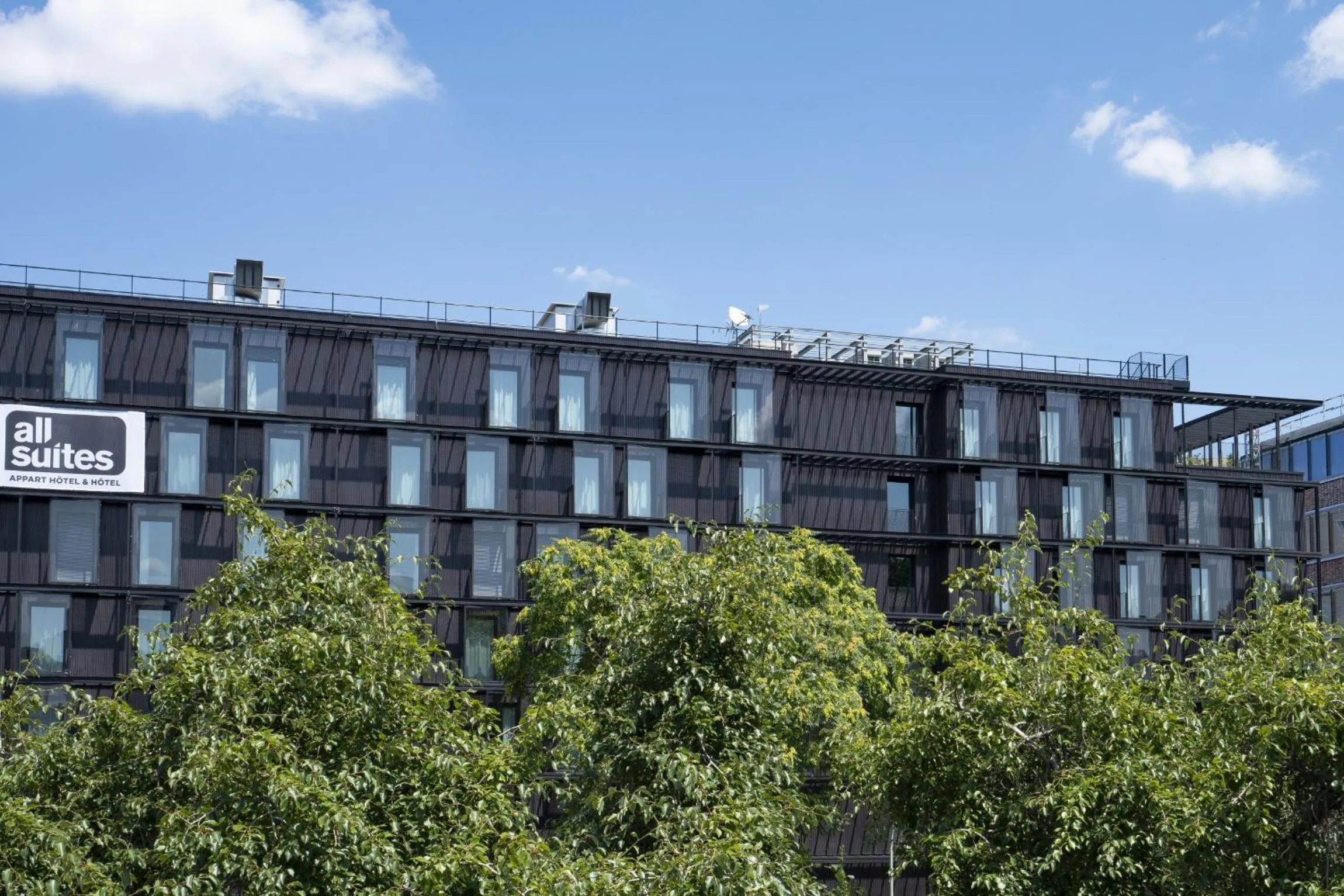 Property building in All Suites Appart Hôtel et Hôtel - Paris 13 - Porte d'Italie