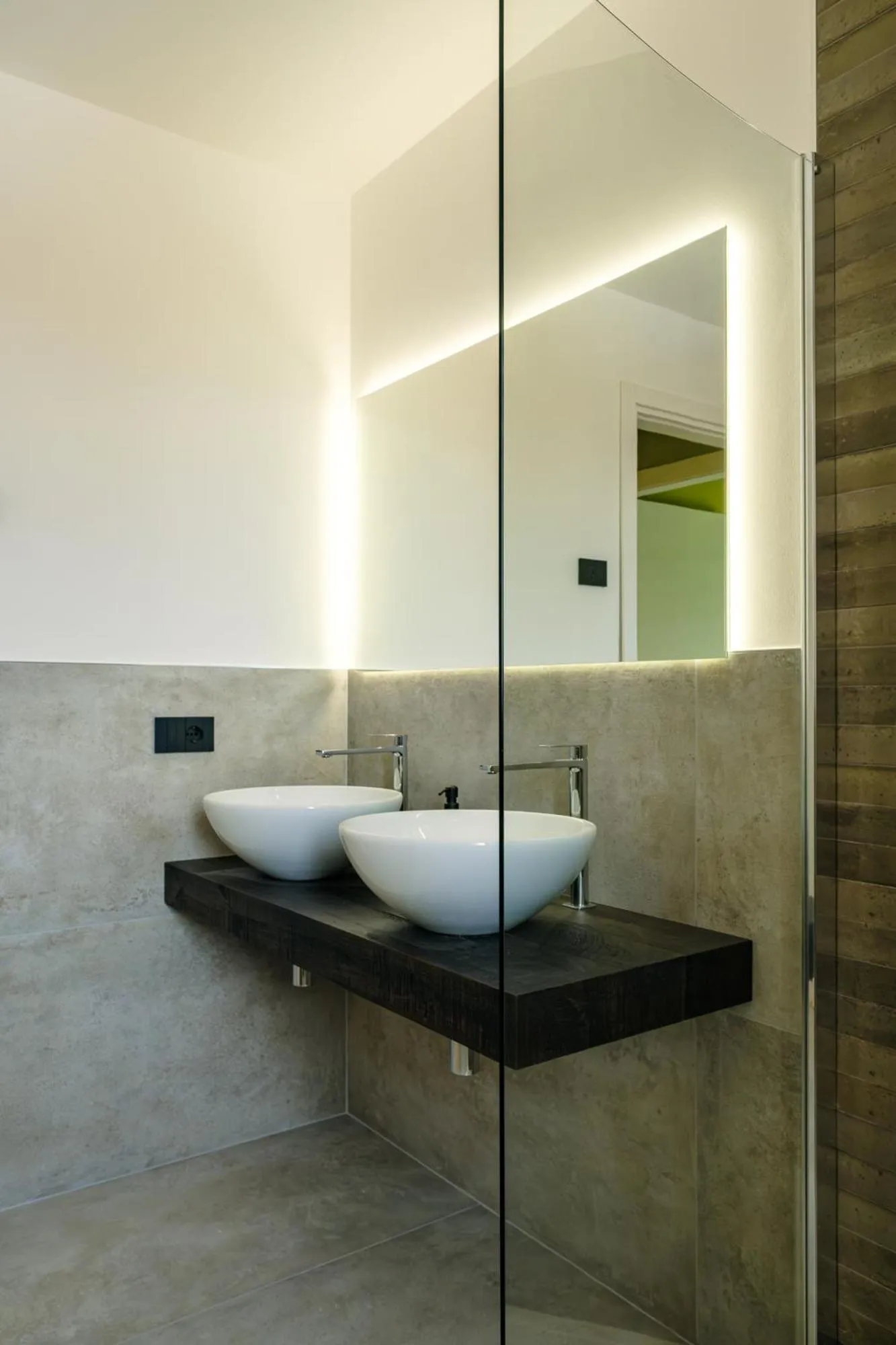 Bathroom in Camoma Aparthotel - Suites Apartments