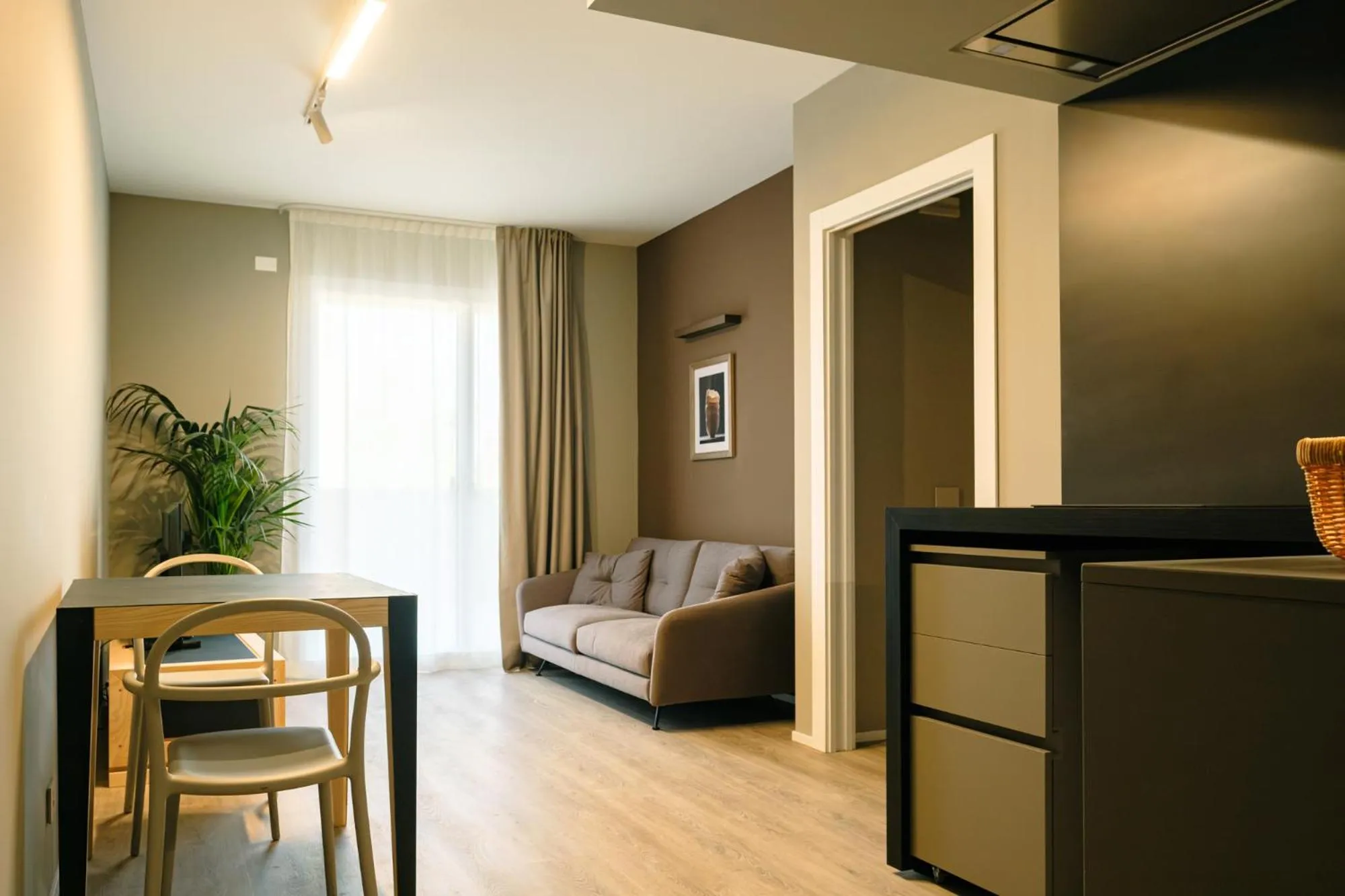 Living room in Camoma Aparthotel - Suites Apartments