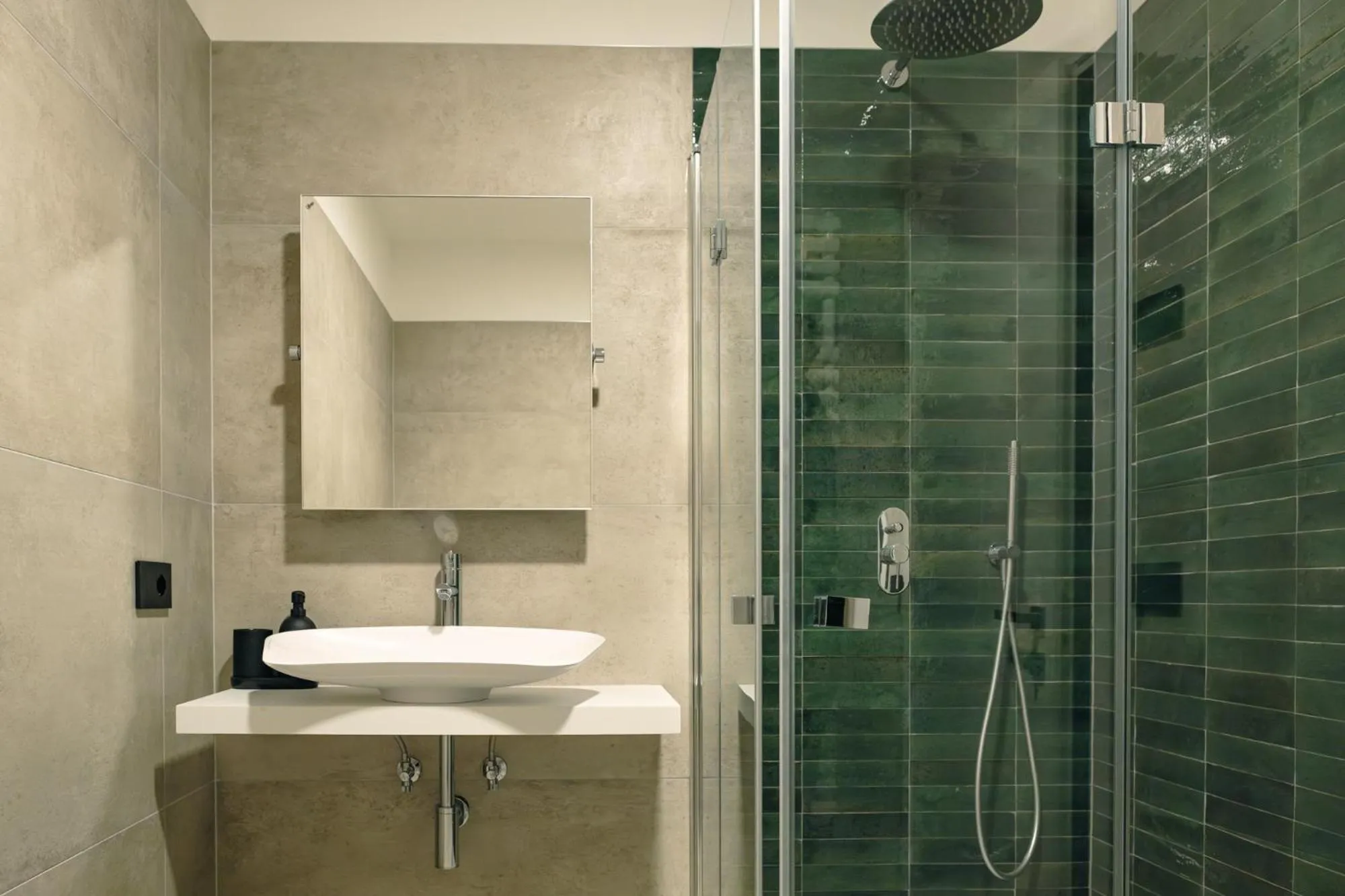 Bathroom in Camoma Aparthotel - Suites Apartments