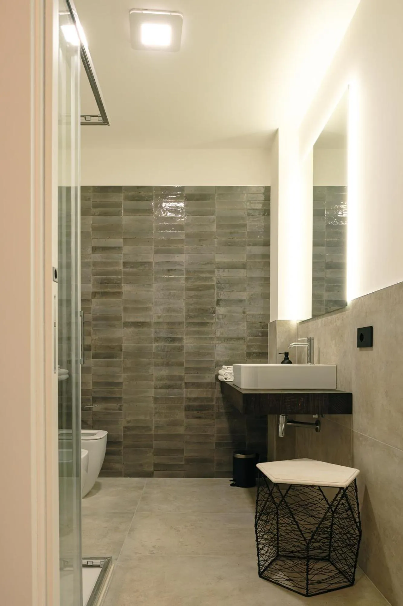 Bathroom in Camoma Aparthotel - Suites Apartments