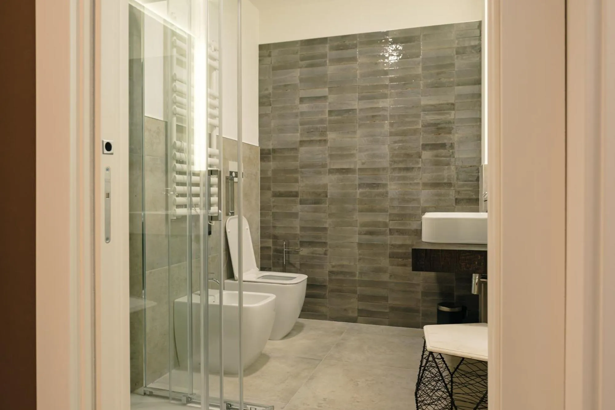 Bathroom in Camoma Aparthotel - Suites Apartments