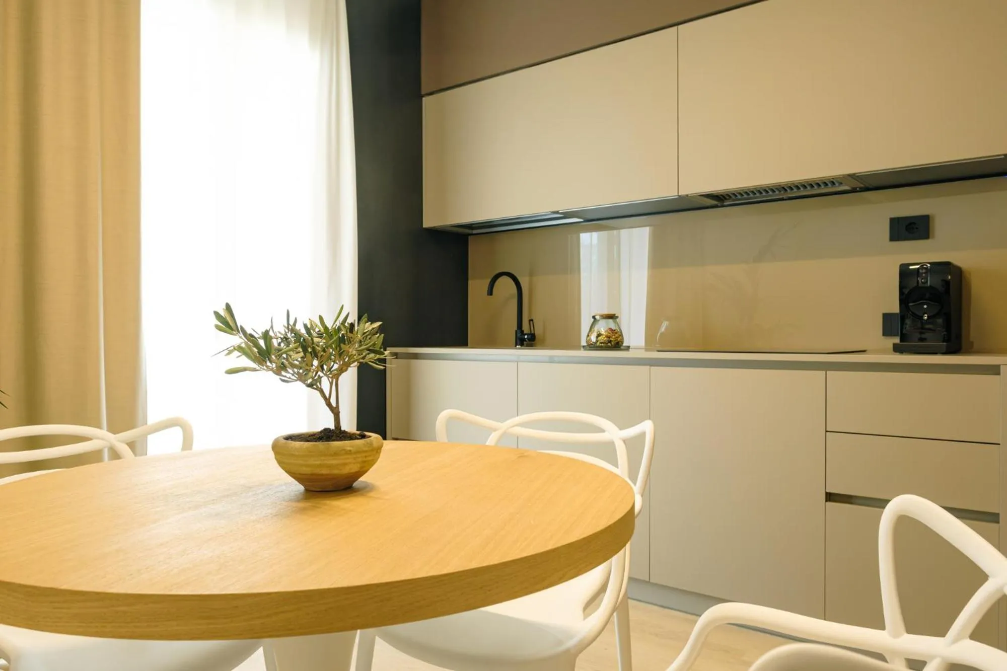 kitchen in Camoma Aparthotel - Suites Apartments