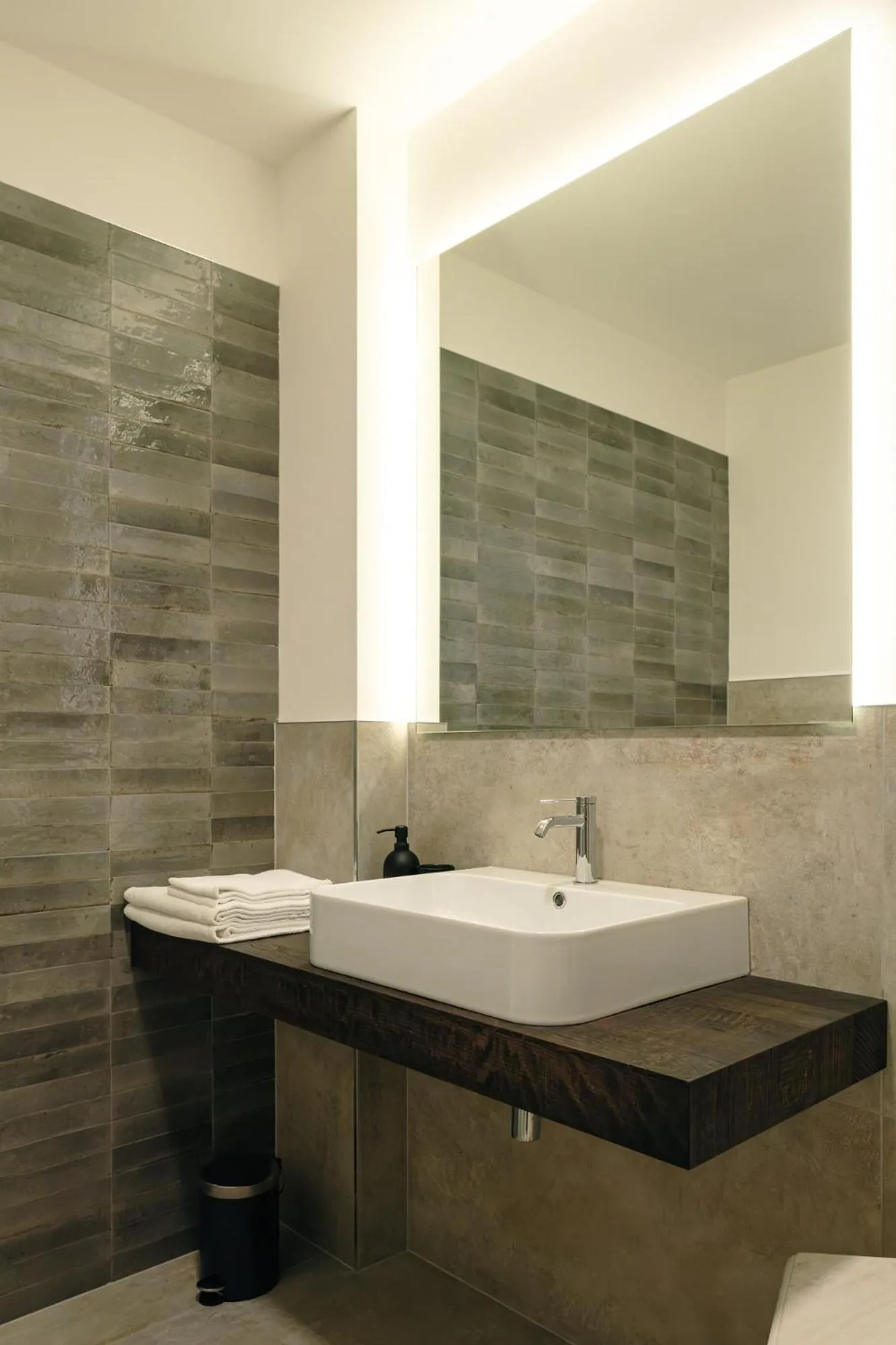 Bathroom in Camoma Aparthotel - Suites Apartments