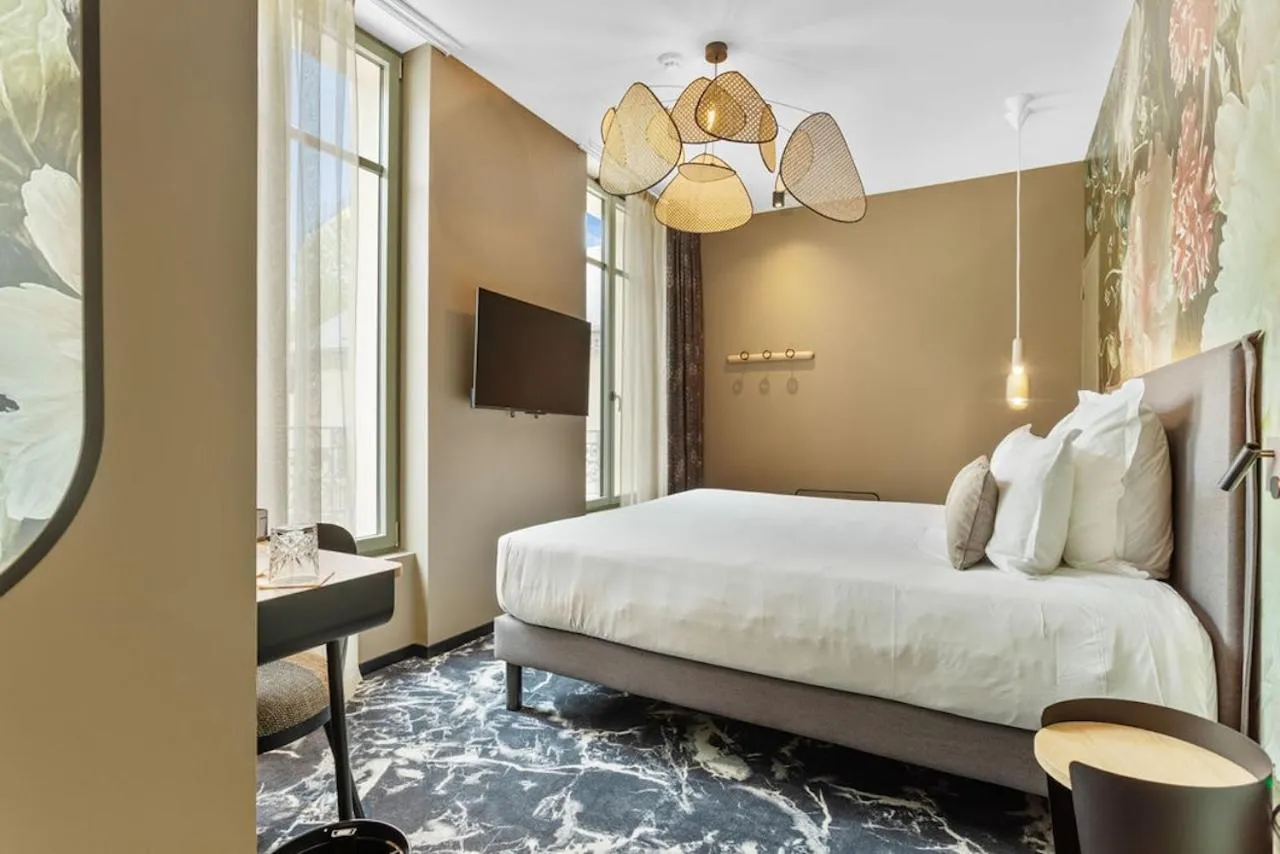 Bed in LE RITUEL HOTEL & SPA