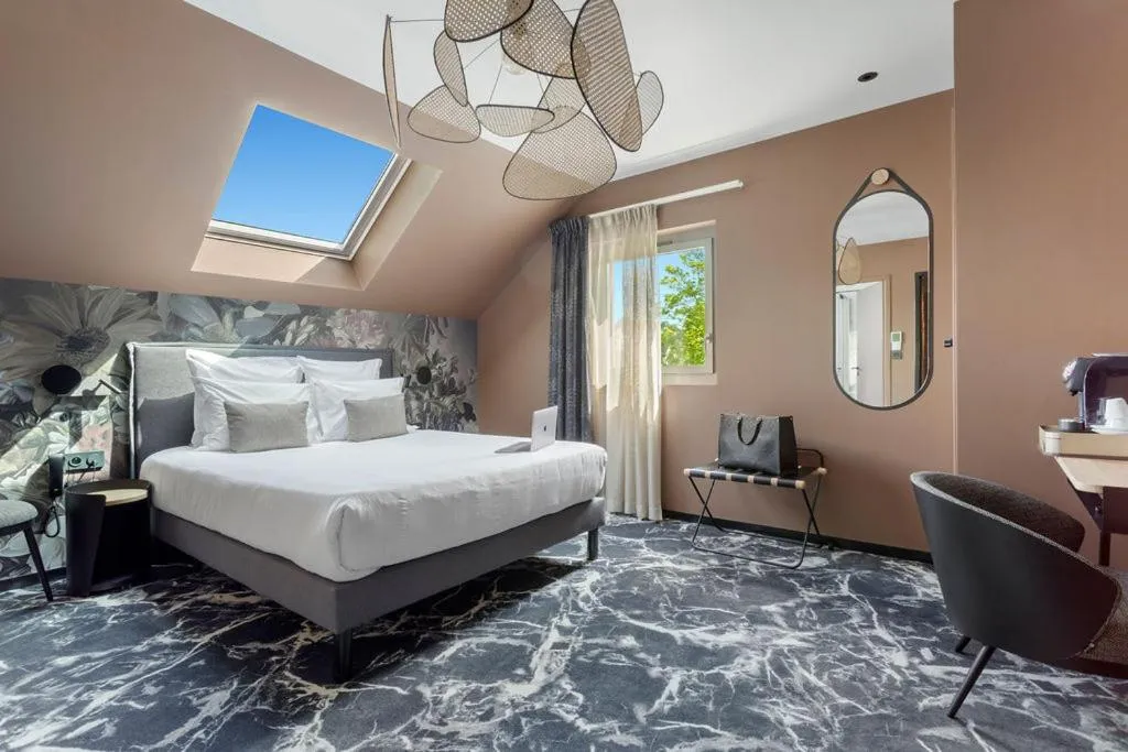 Bed in LE RITUEL HOTEL & SPA