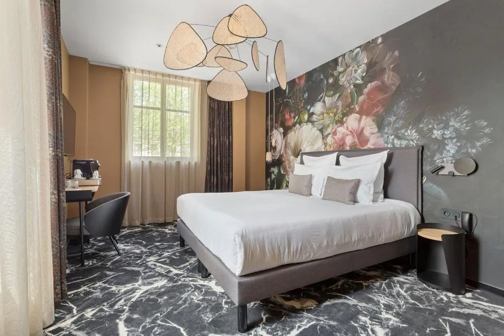 Bed in LE RITUEL HOTEL & SPA